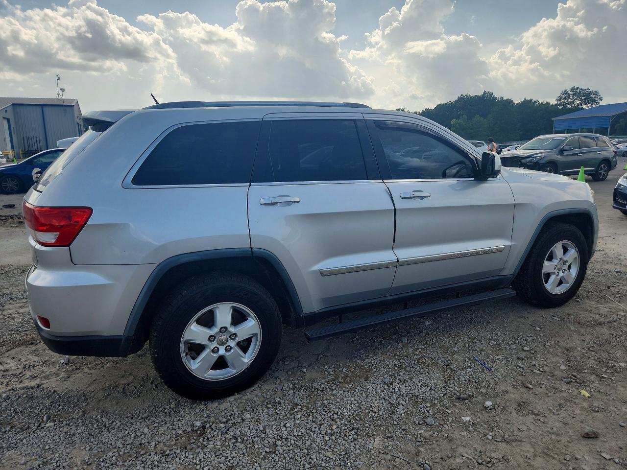 2012 Jeep Grand Cherokee Laredo Серебряный vin: 1C4RJEAG8CC290665