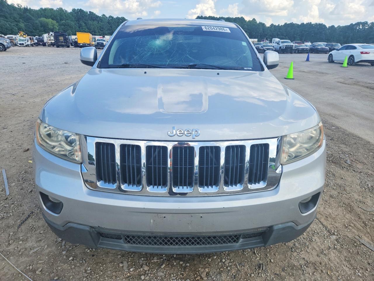 2012 Jeep Grand Cherokee Laredo Серебряный vin: 1C4RJEAG8CC290665