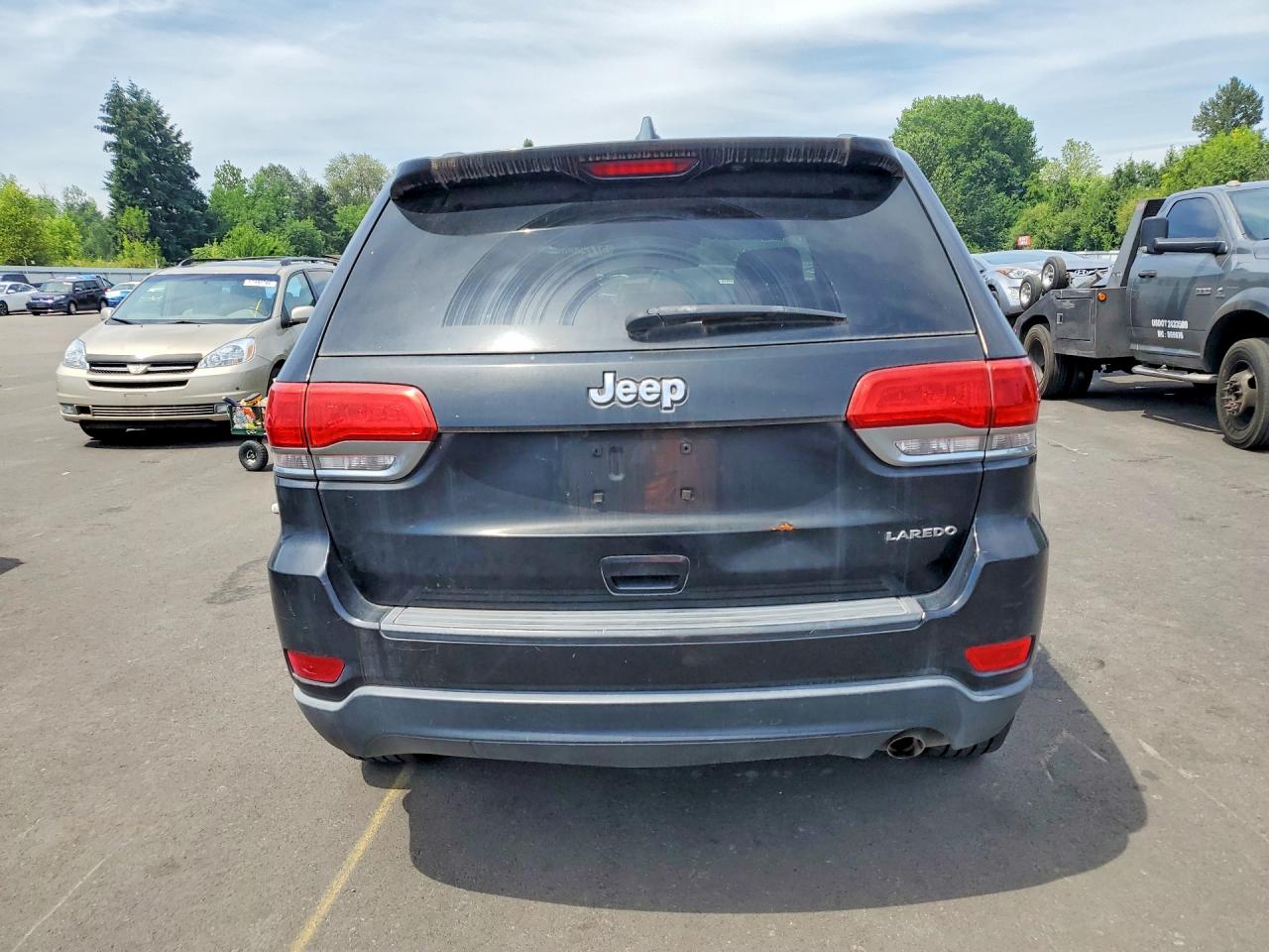 2015 Jeep Grand Cherokee Laredo Черный vin: 1C4RJEAG8FC713930