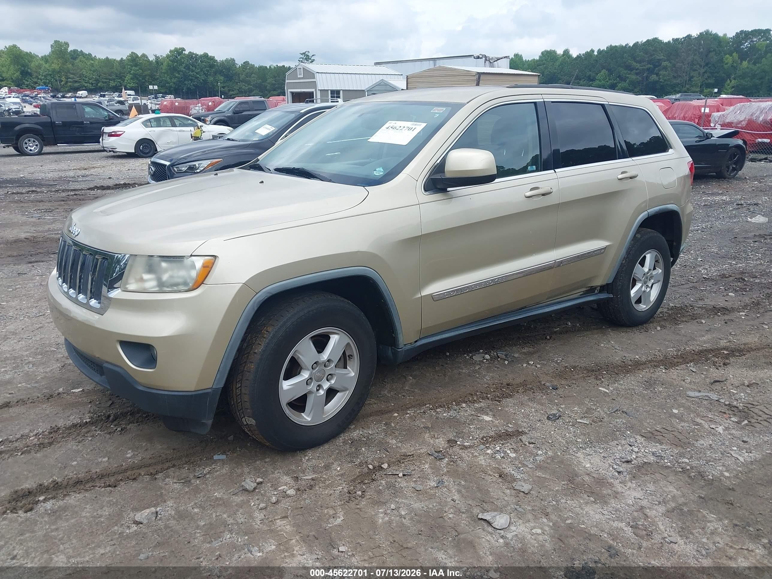2012 Jeep Grand Cherokee Laredo Beige vin: 1C4RJEAG9CC167277