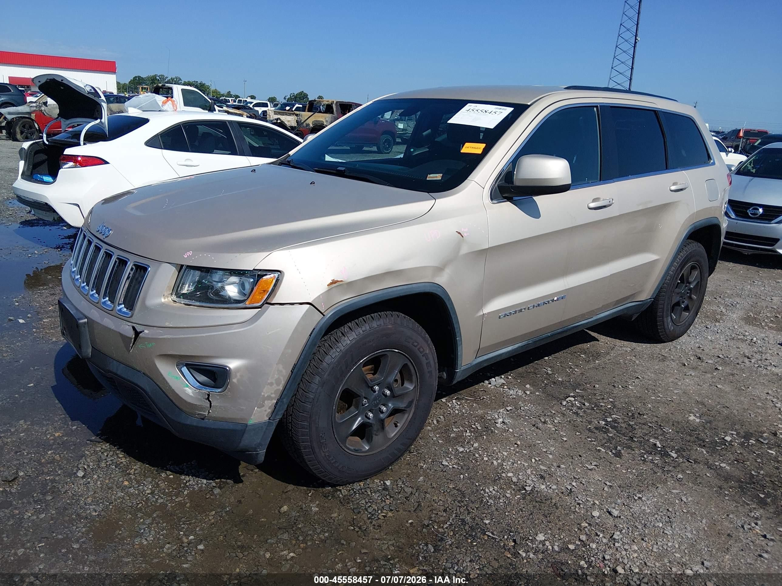 2014 Jeep Grand Cherokee Laredo Золотой vin: 1C4RJEAG9EC248735