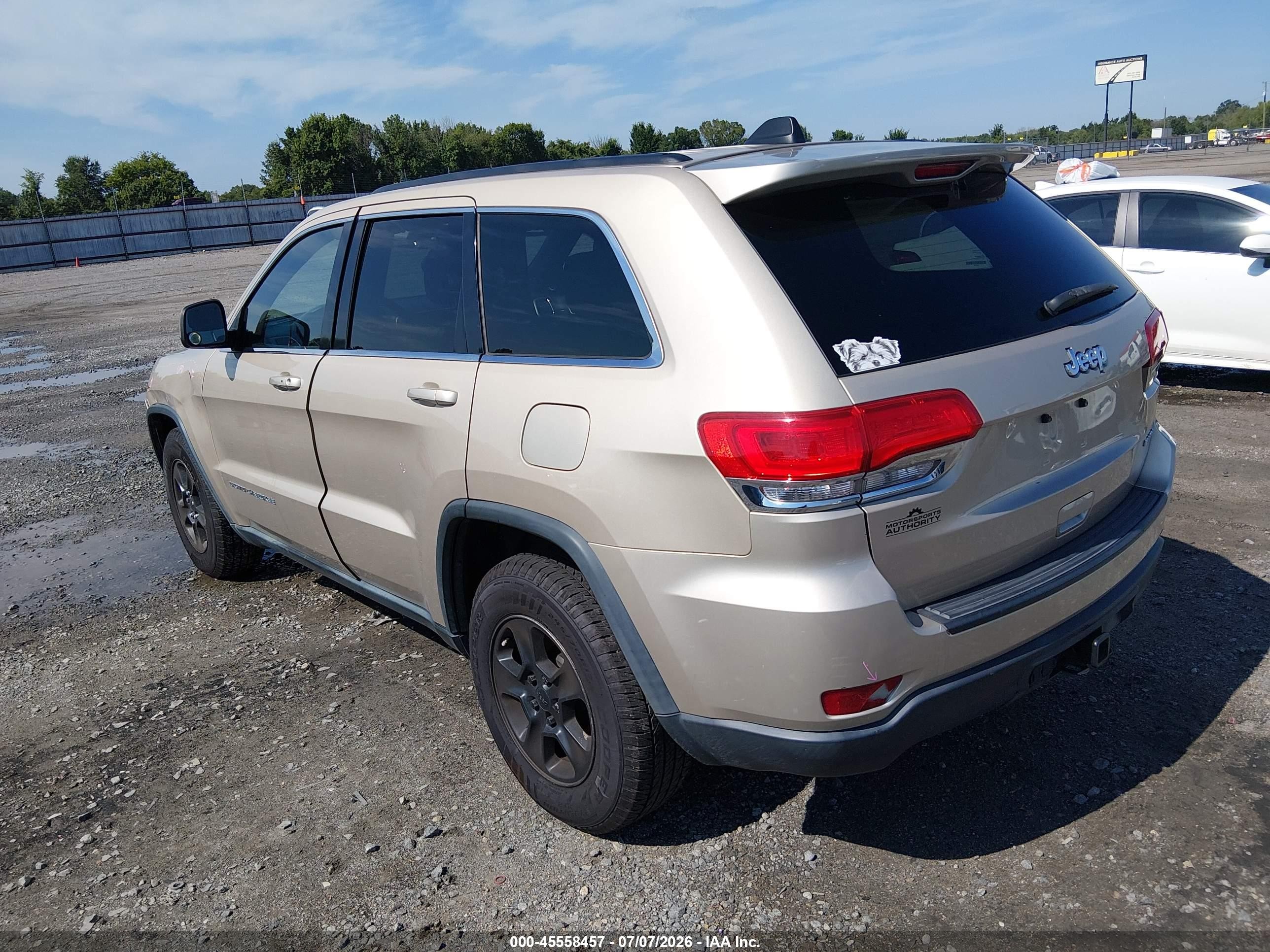 2014 Jeep Grand Cherokee Laredo Золотой vin: 1C4RJEAG9EC248735