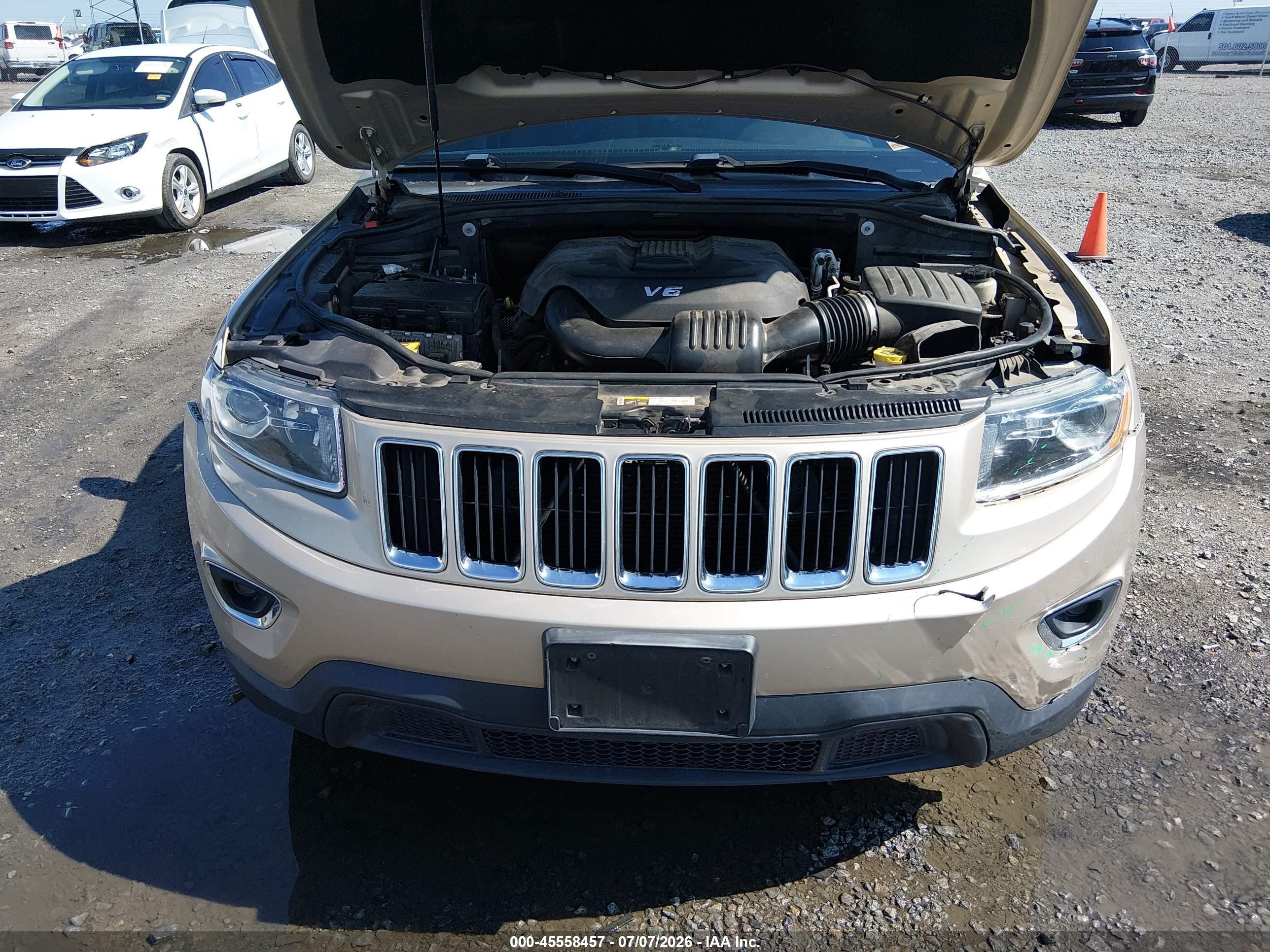 2014 Jeep Grand Cherokee Laredo Золотой vin: 1C4RJEAG9EC248735