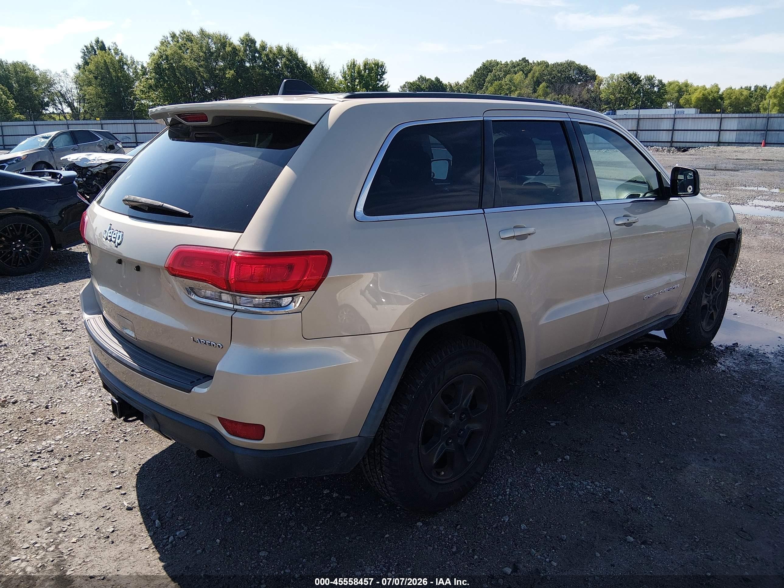 2014 Jeep Grand Cherokee Laredo Золотой vin: 1C4RJEAG9EC248735