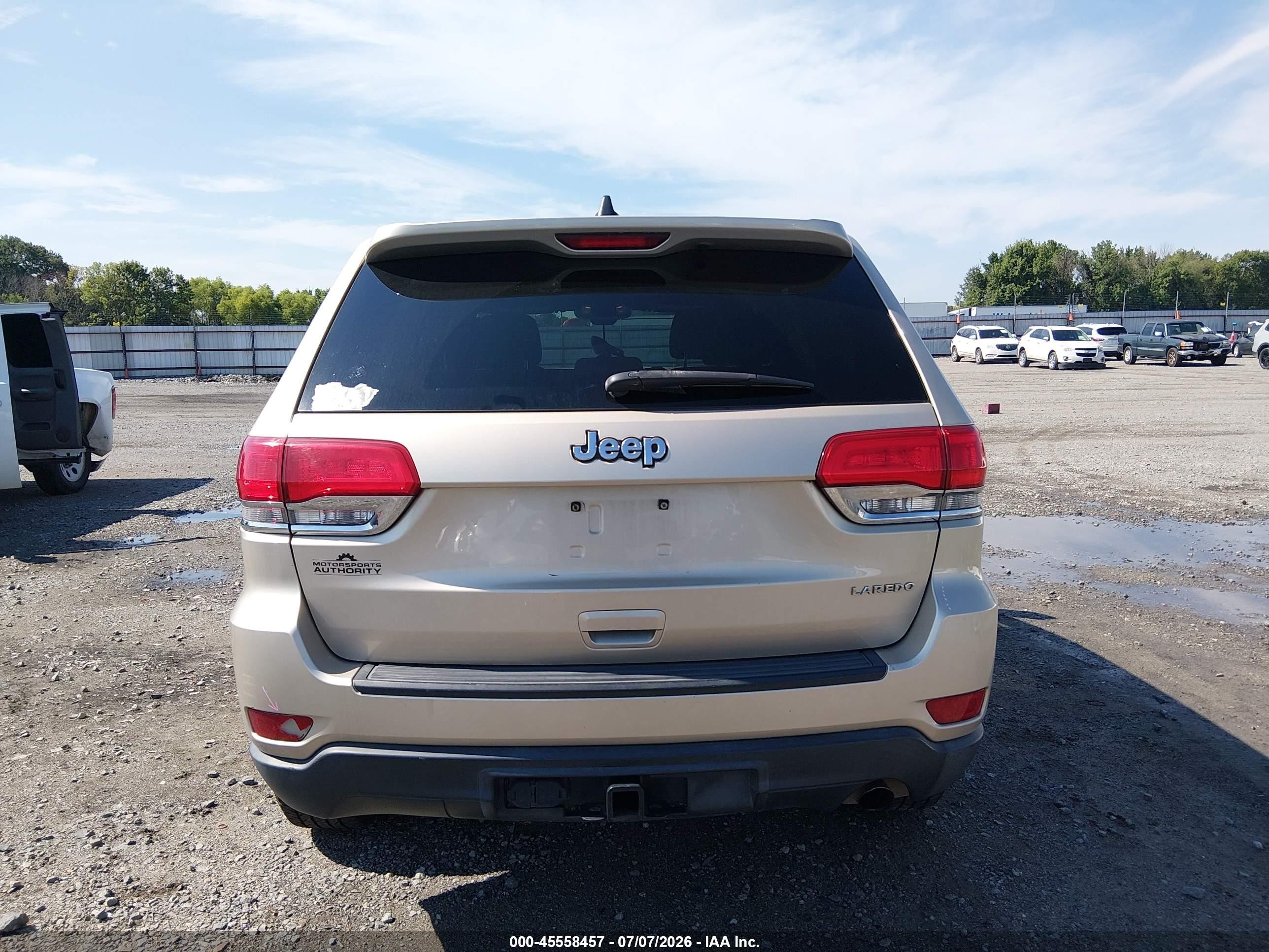 2014 Jeep Grand Cherokee Laredo Золотой vin: 1C4RJEAG9EC248735