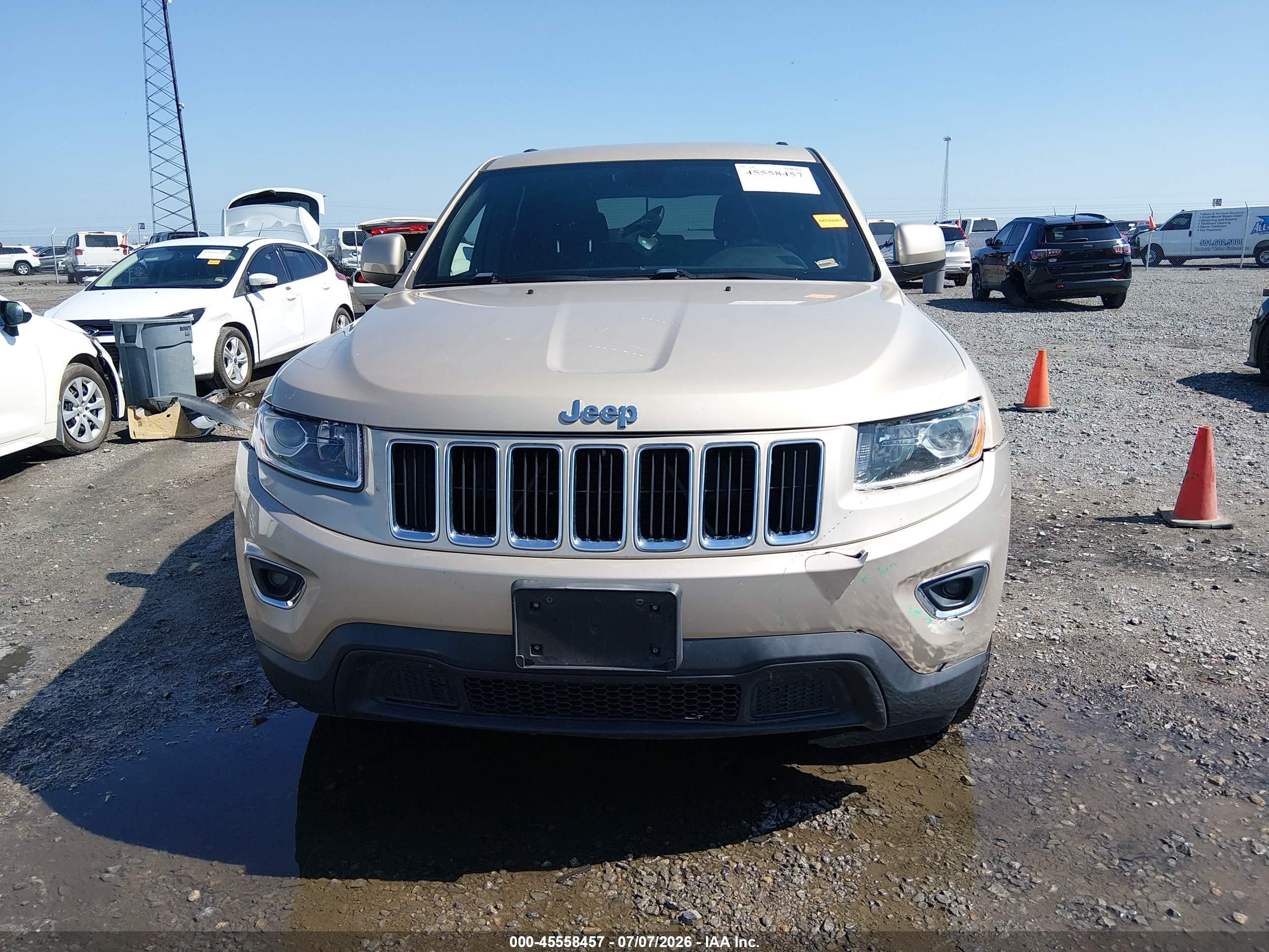 2014 Jeep Grand Cherokee Laredo Золотой vin: 1C4RJEAG9EC248735