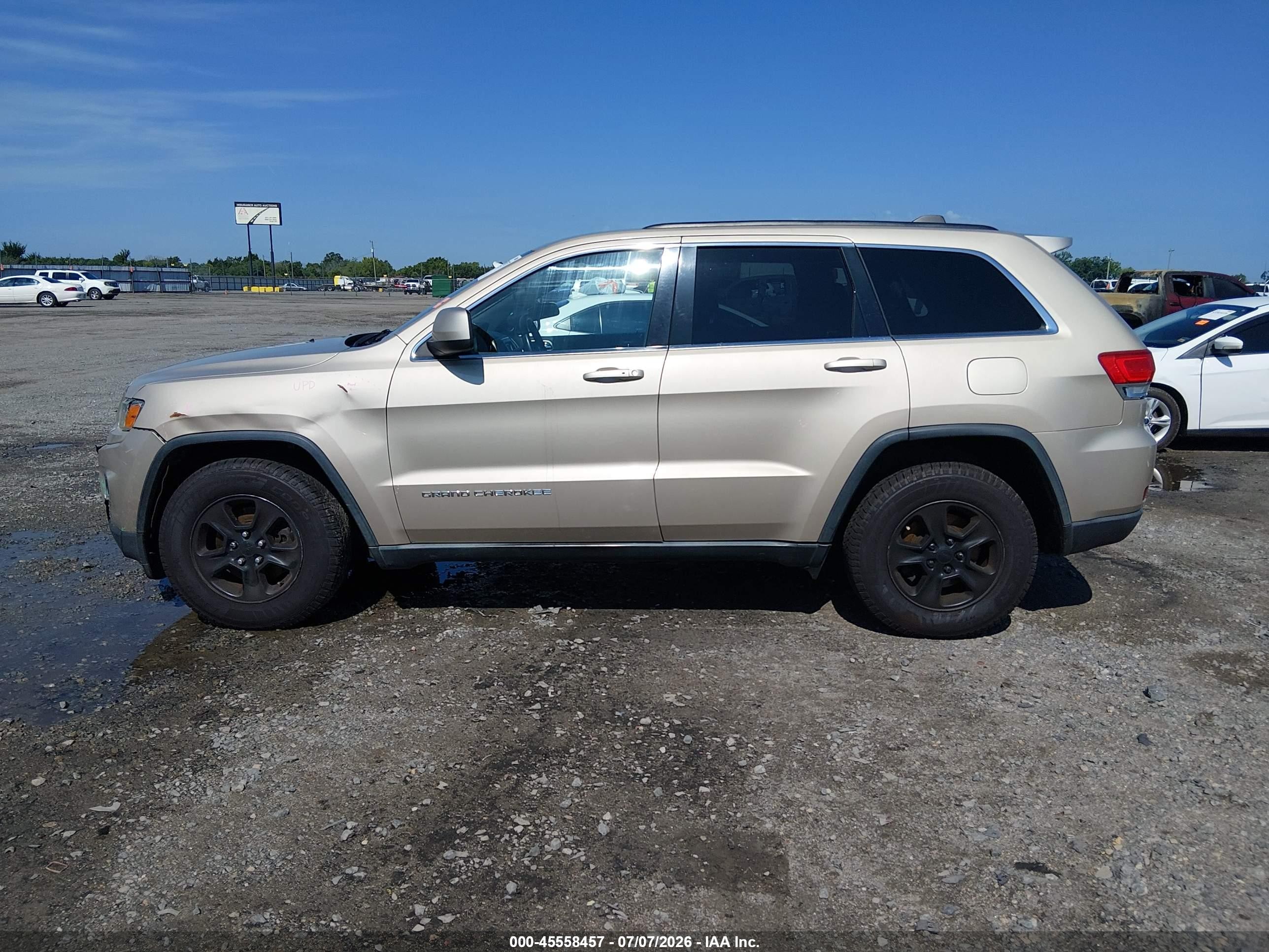2014 Jeep Grand Cherokee Laredo Золотой vin: 1C4RJEAG9EC248735