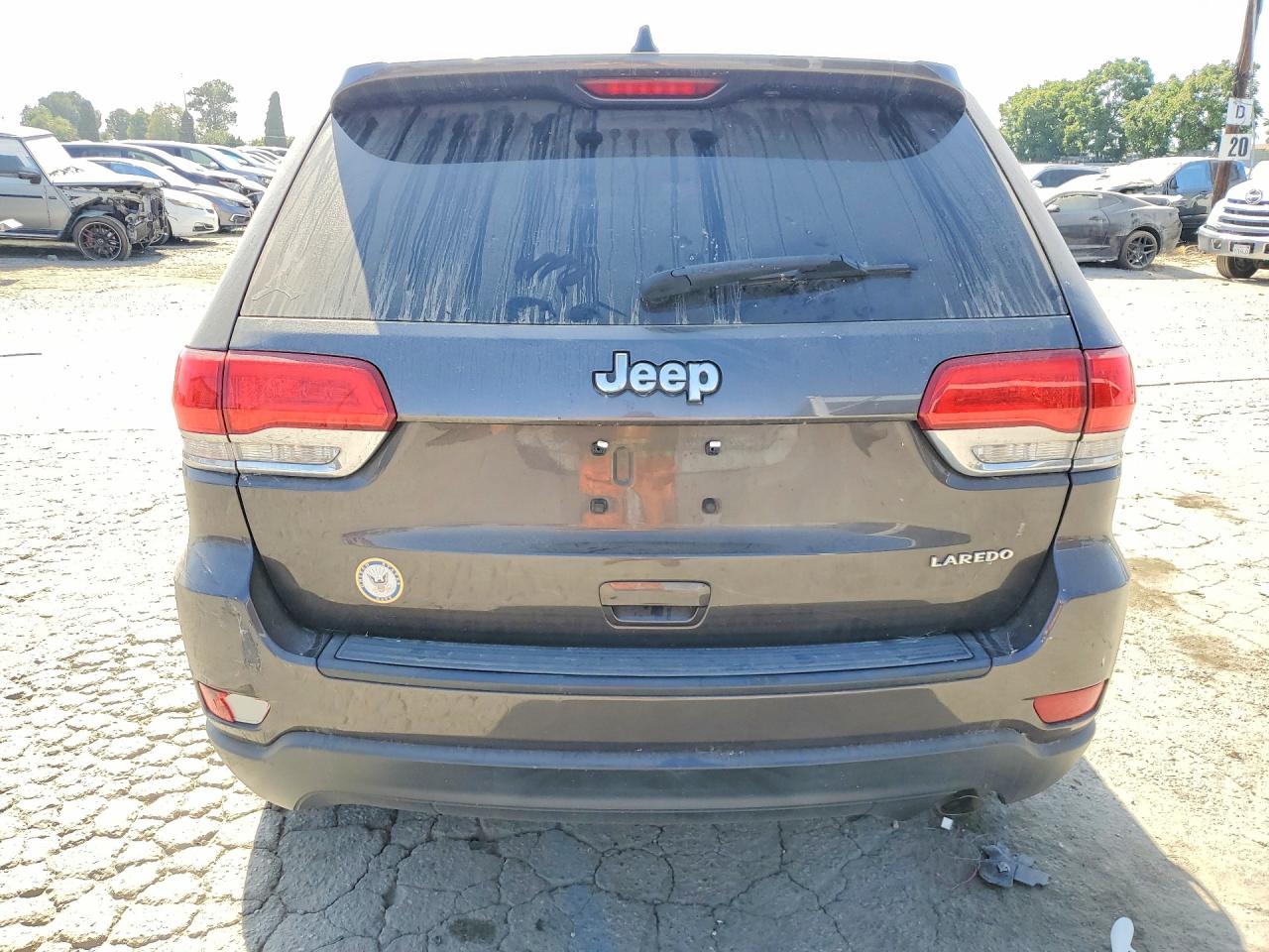 2015 Jeep Grand Cherokee Laredo Серый vin: 1C4RJEAG9FC231810