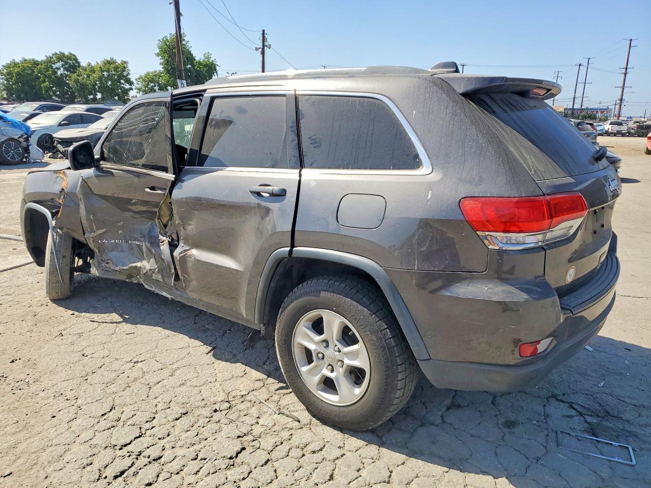 2015 Jeep Grand Cherokee Laredo Серый vin: 1C4RJEAG9FC231810