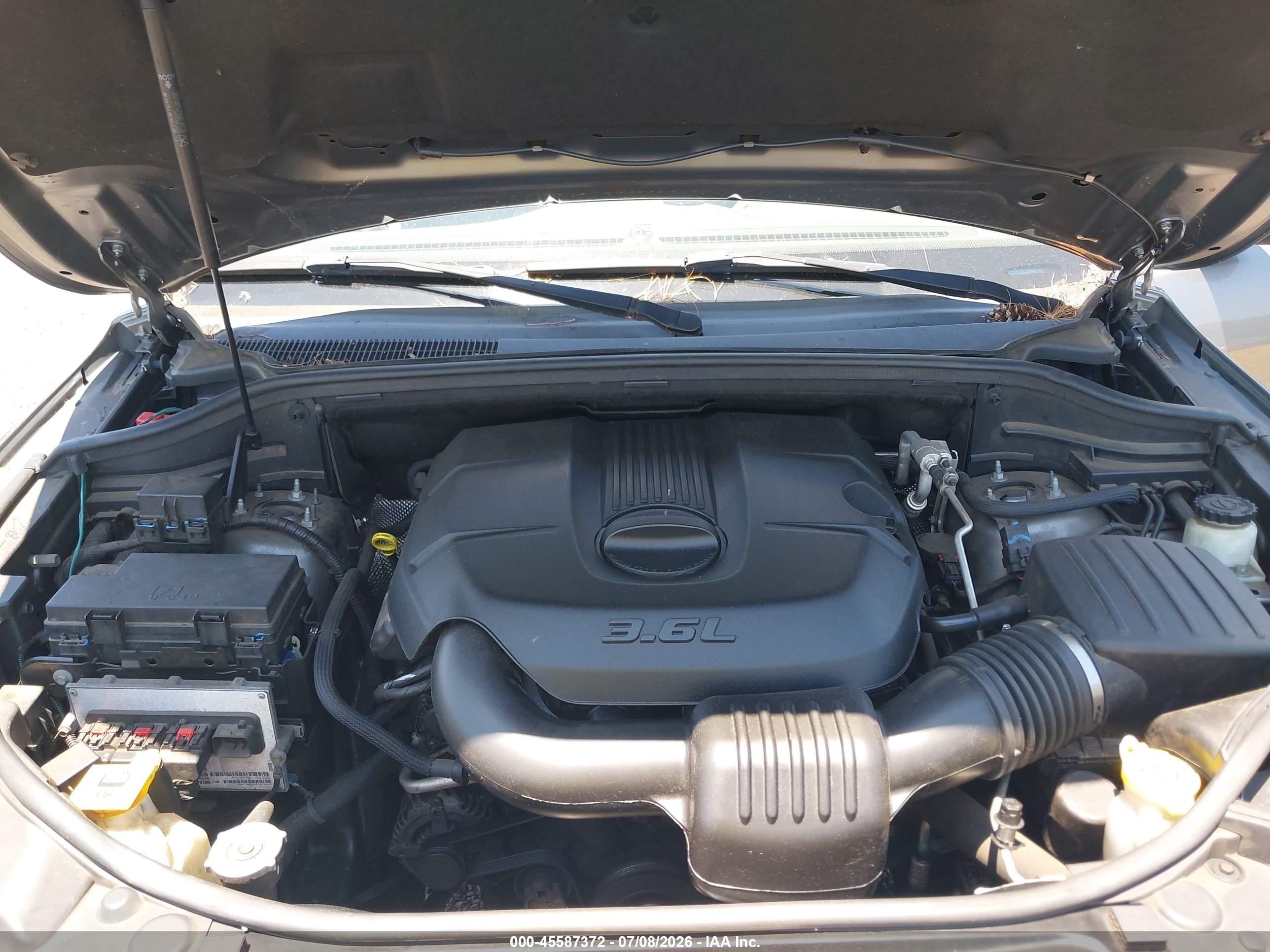 2012 Jeep Grand Cherokee Laredo Серебряный vin: 1C4RJEAGXCC142811