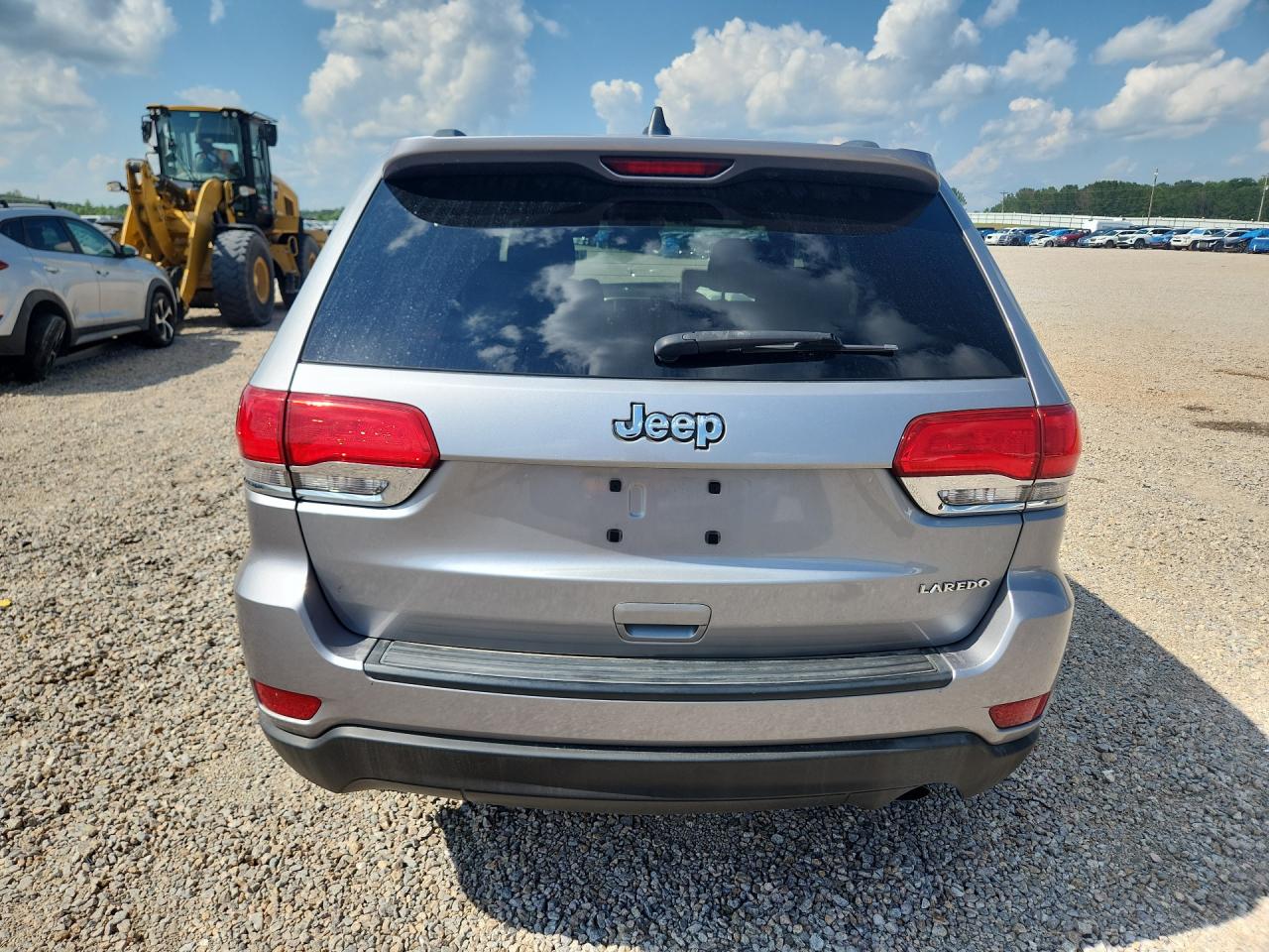 2015 Jeep Grand Cherokee Laredo Серебряный vin: 1C4RJEAGXFC713668