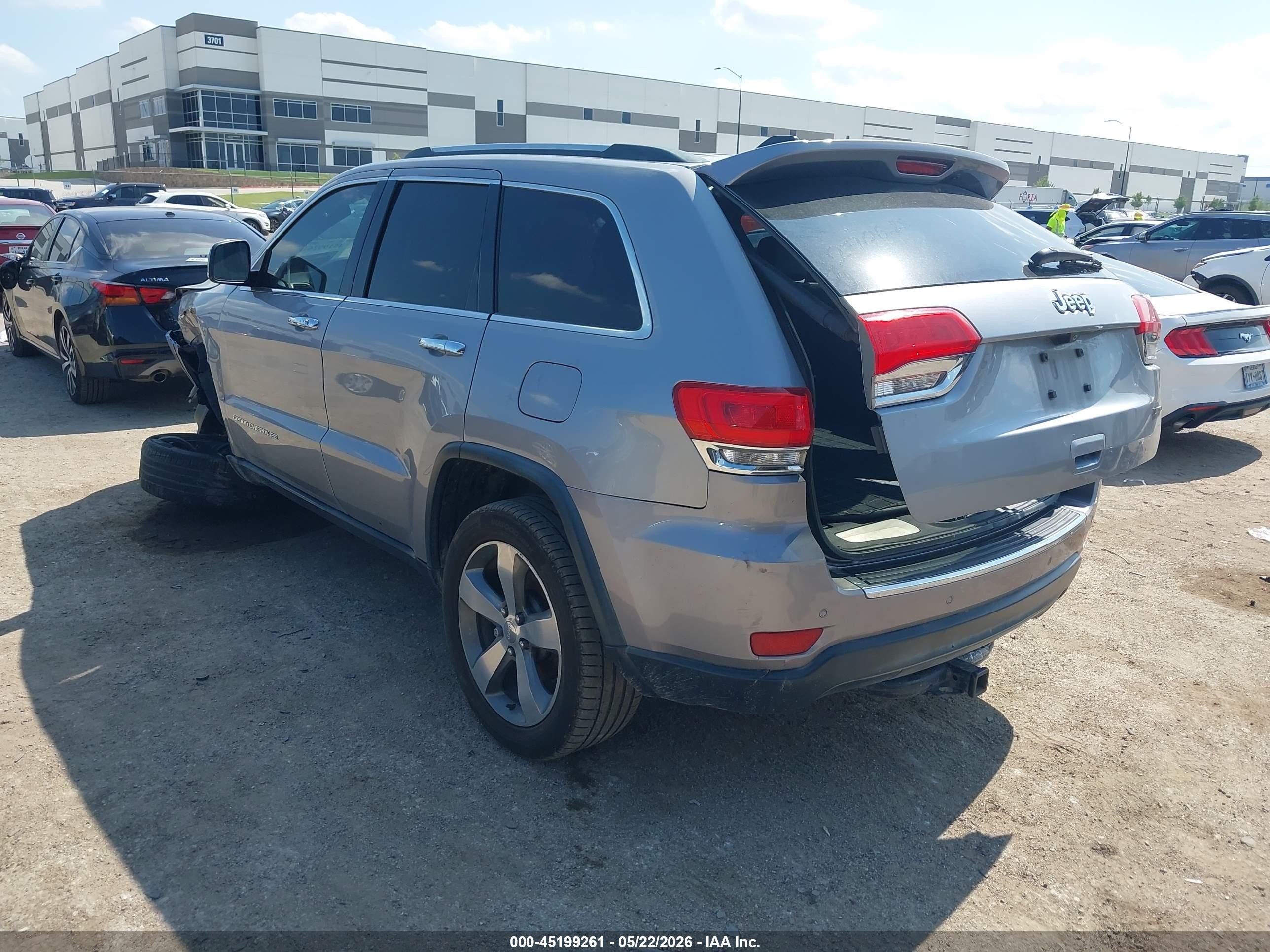 2015 Jeep Grand Cherokee Limited Серебряный vin: 1C4RJEBG7FC906505