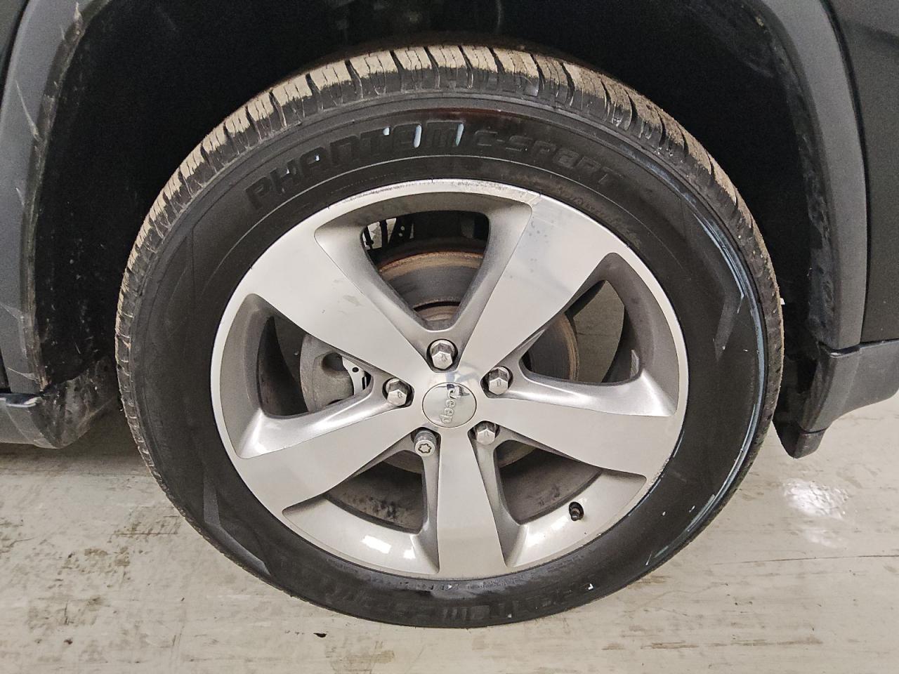 2014 Jeep Grand Cherokee Limited Black vin: 1C4RJEBT1EC192317 Damage: Right Front Wheel, Curb Rash, > 12 Inches