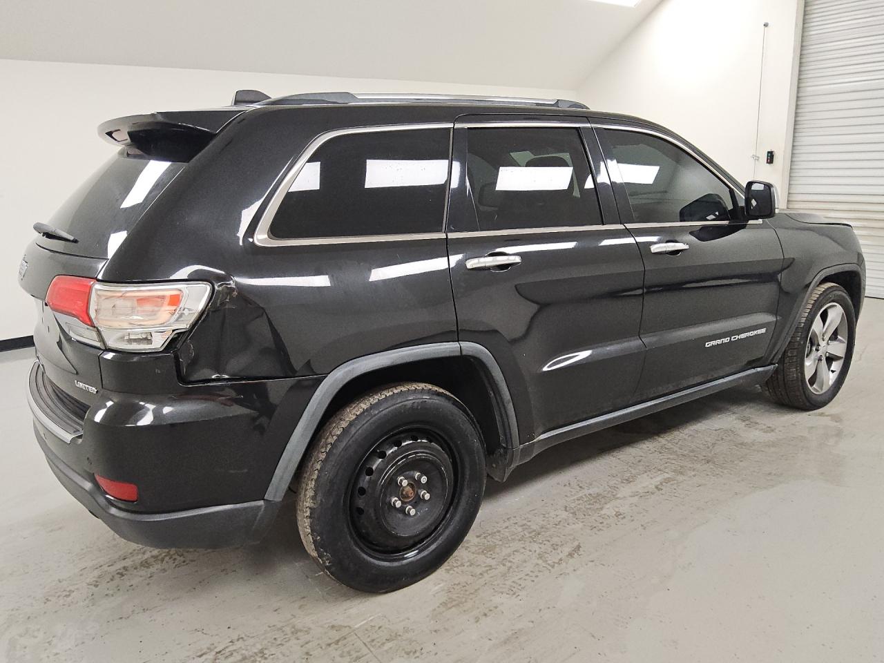 2014 Jeep Grand Cherokee Limited Black vin: 1C4RJEBT1EC192317 Damage: Right Tail Light, Broken, Replacement Required