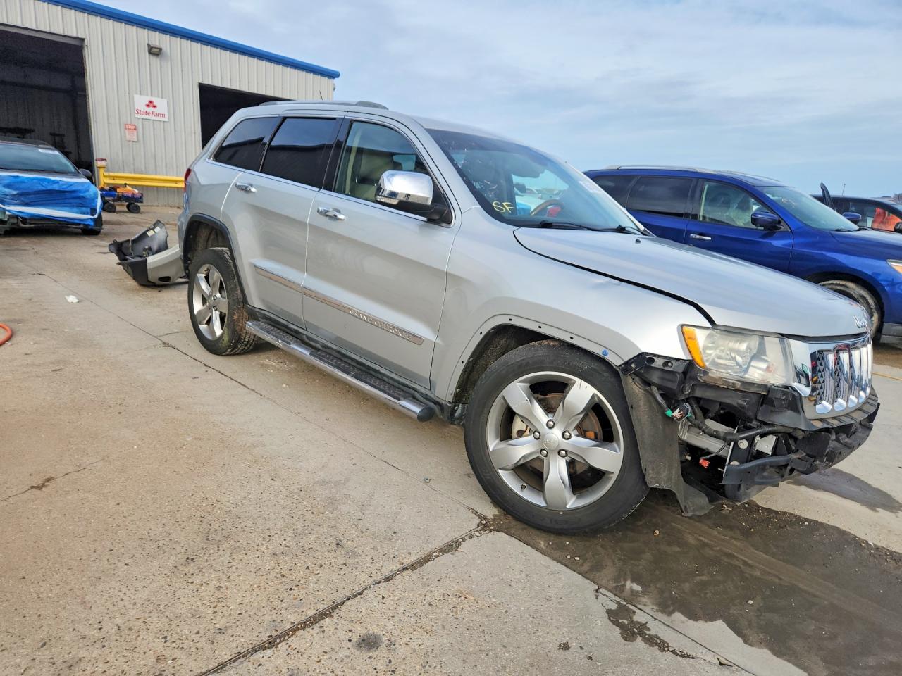 2012 Jeep Grand Cherokee Overland Серебряный vin: 1C4RJECG1CC190257