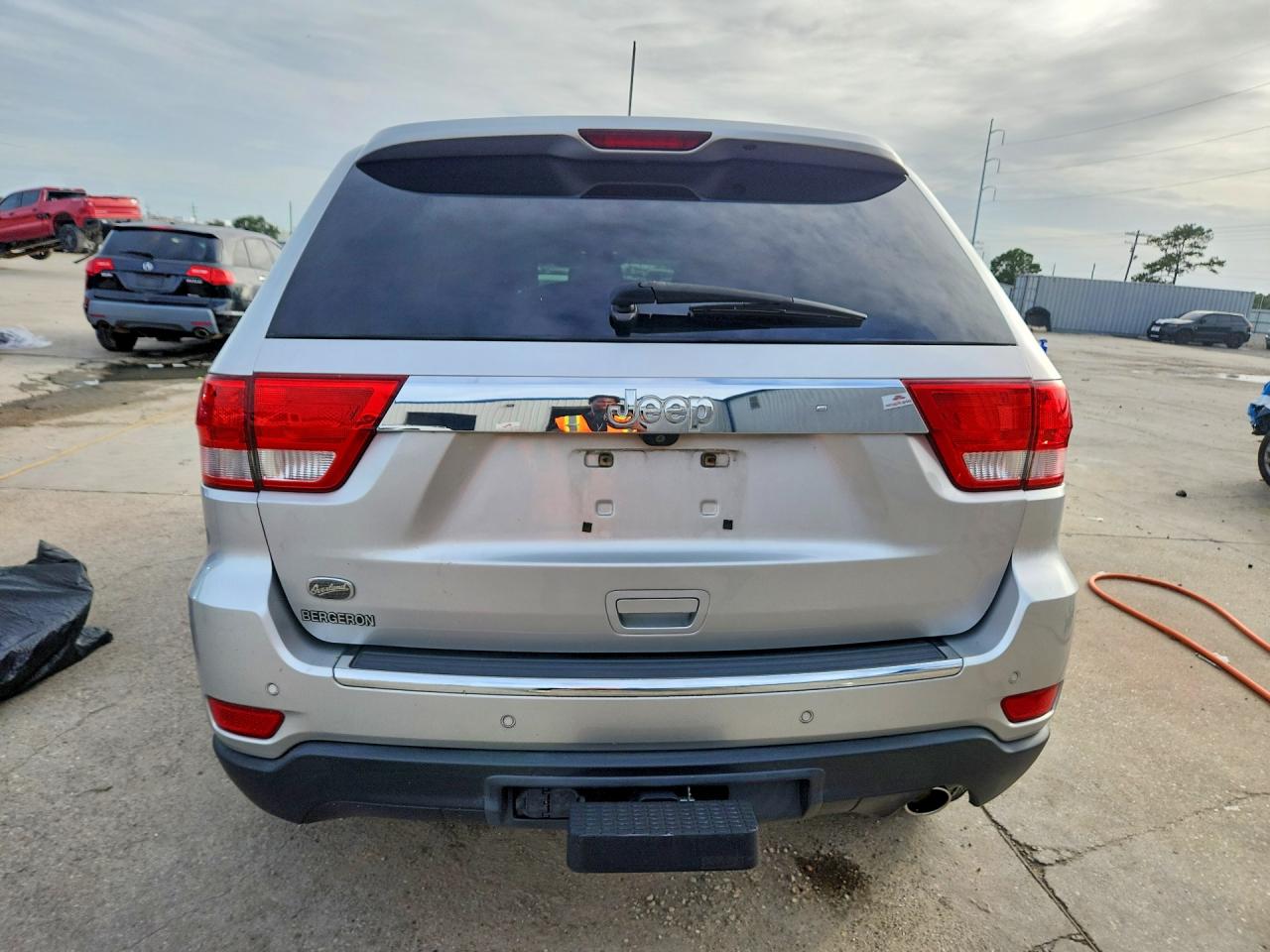 2012 Jeep Grand Cherokee Overland Серебряный vin: 1C4RJECG1CC190257