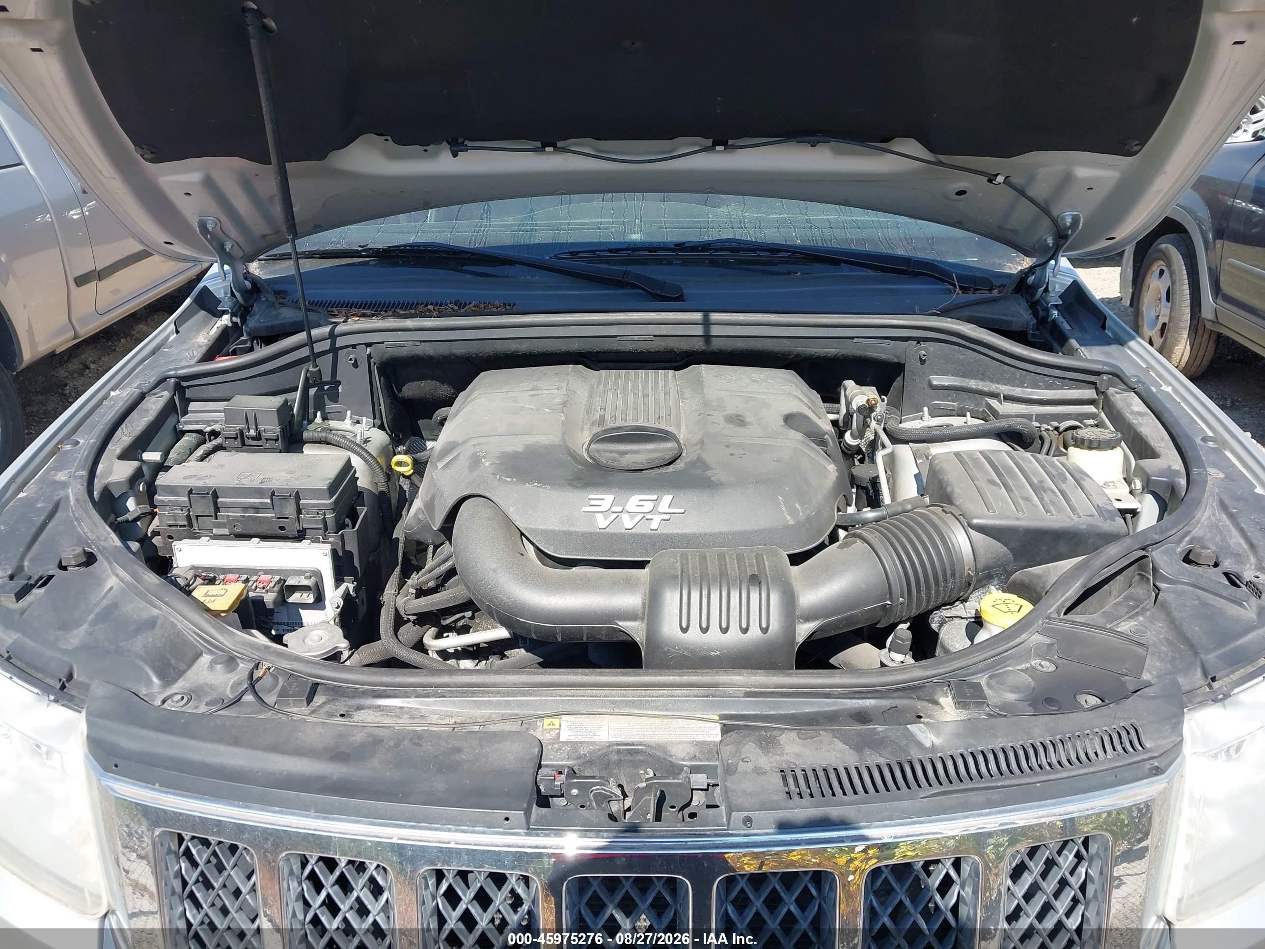 2013 Jeep Grand Cherokee Overland Silver vin: 1C4RJECG1DC621438