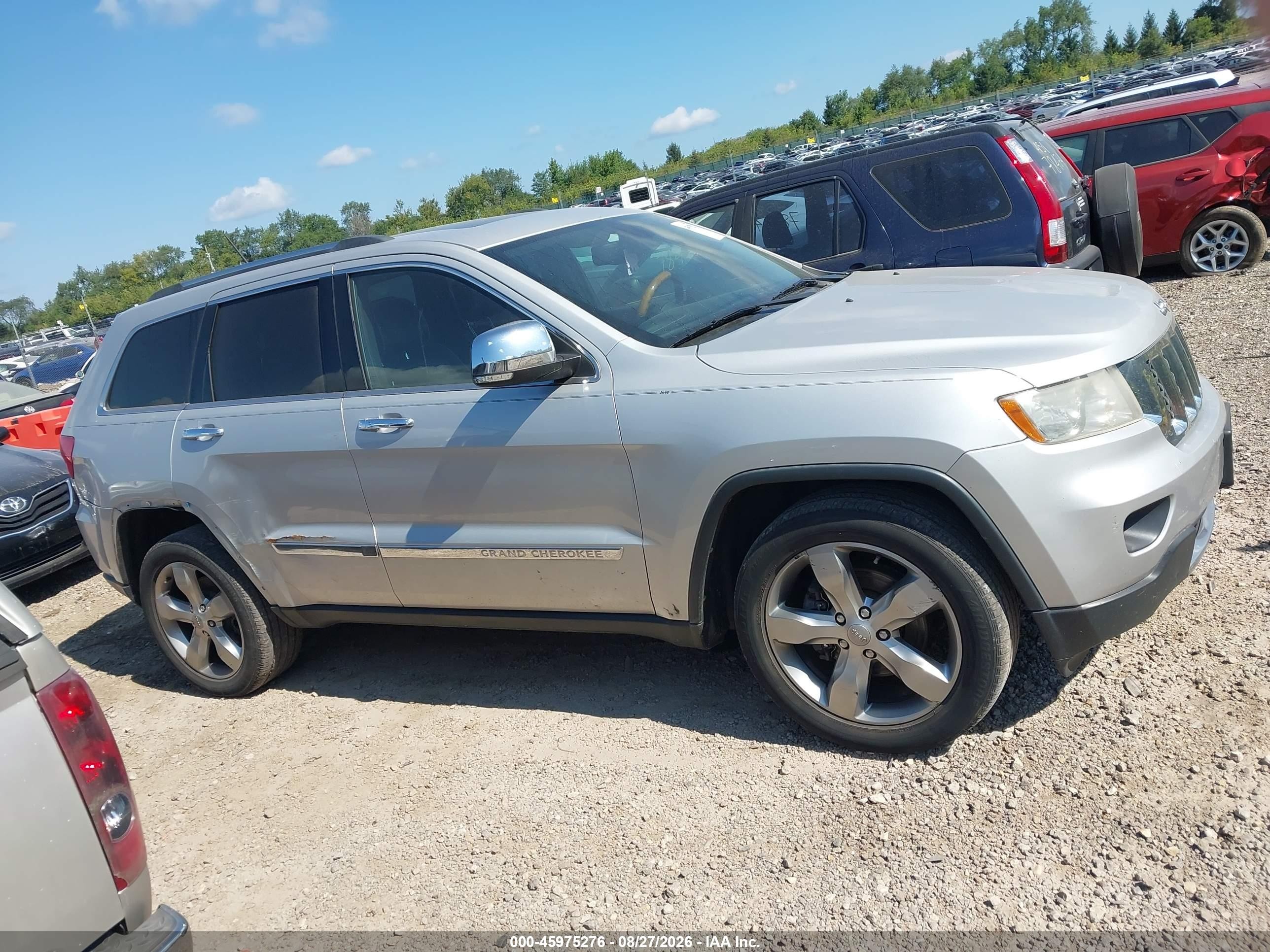 2013 Jeep Grand Cherokee Overland Silver vin: 1C4RJECG1DC621438