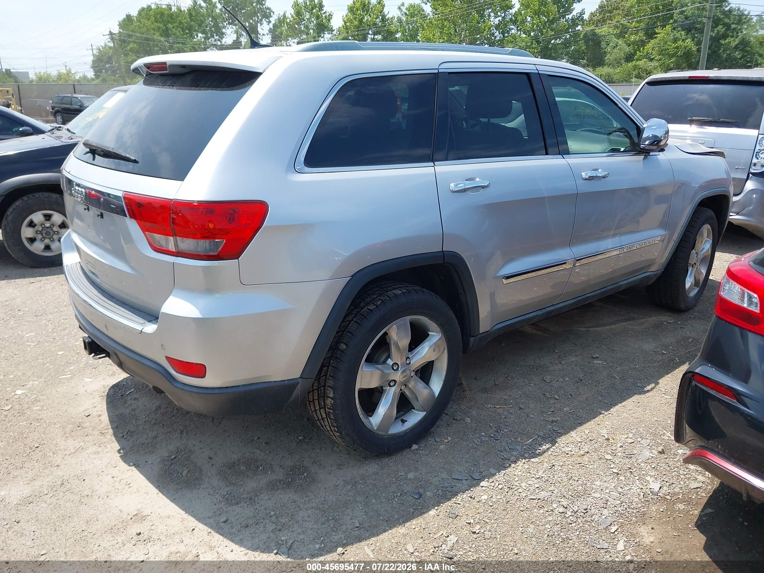 2012 Jeep Grand Cherokee Overland Silver vin: 1C4RJECG3CC204384