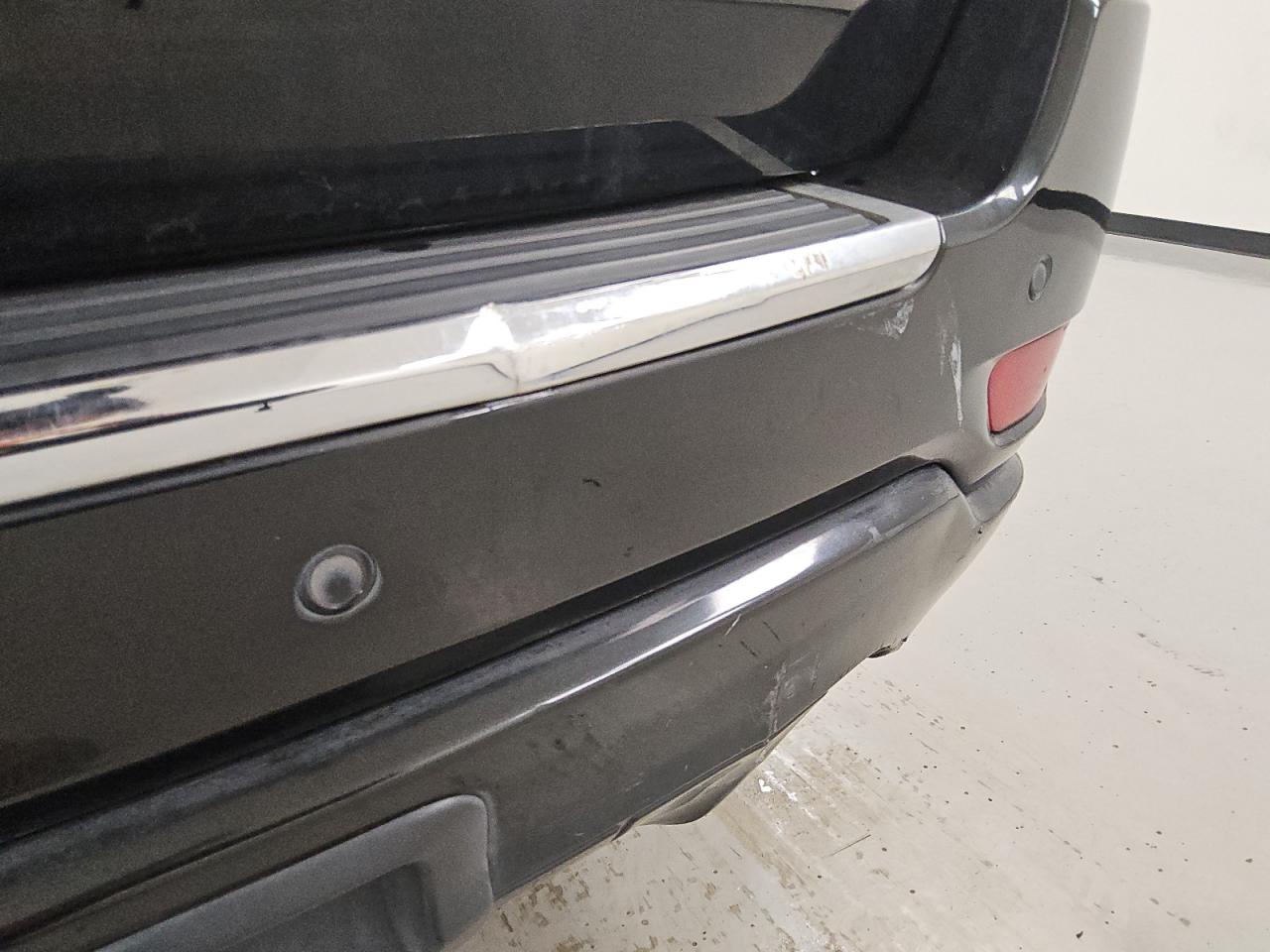 2015 Jeep Grand Cherokee Overland Black vin: 1C4RJECGXFC920333 Damage: Rear Bumper, Dent(S) W/ Paint Dmg, 7 To 8 Inches