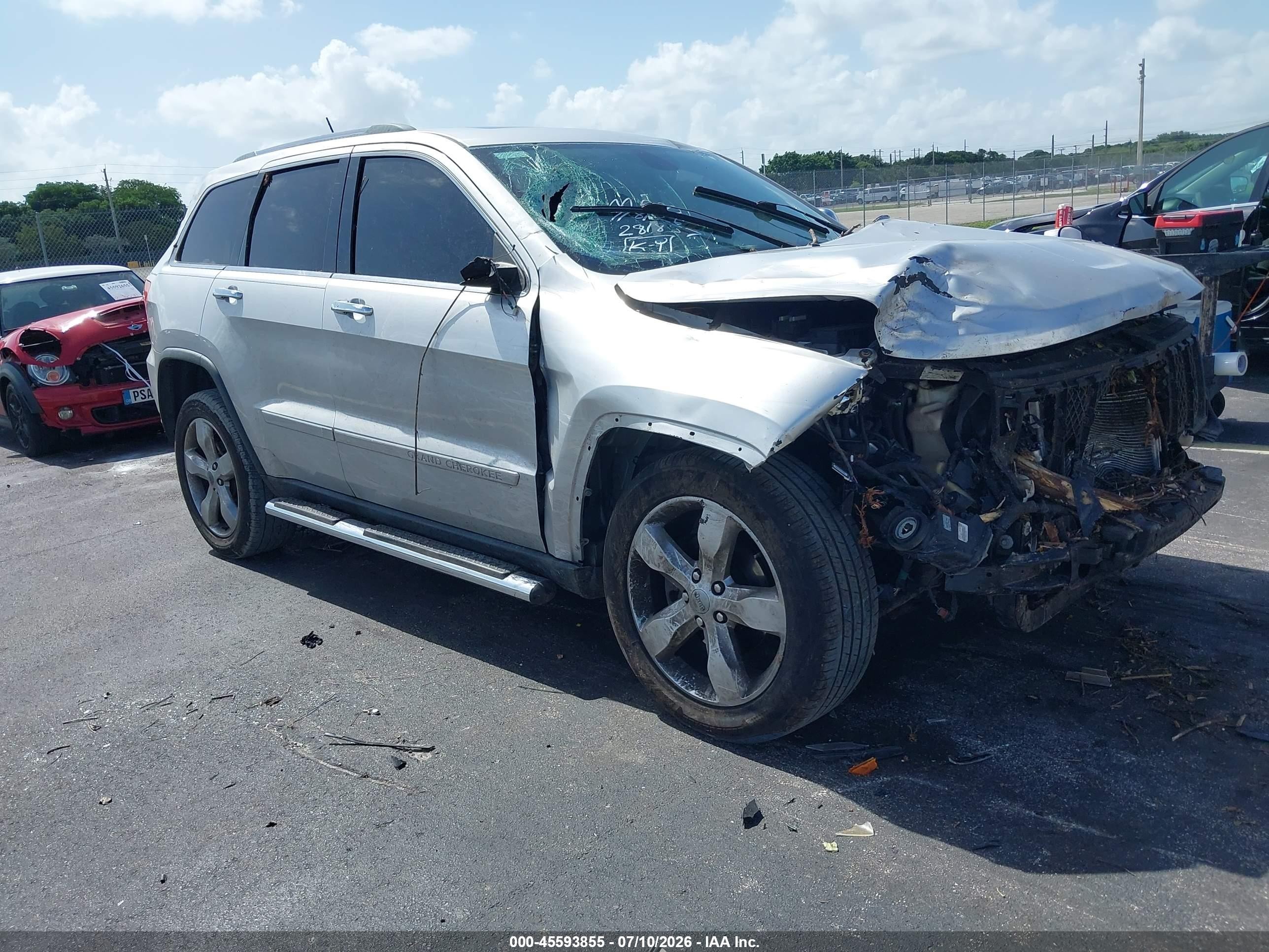 2012 Jeep Grand Cherokee Overland Silver vin: 1C4RJECT2CC281857
