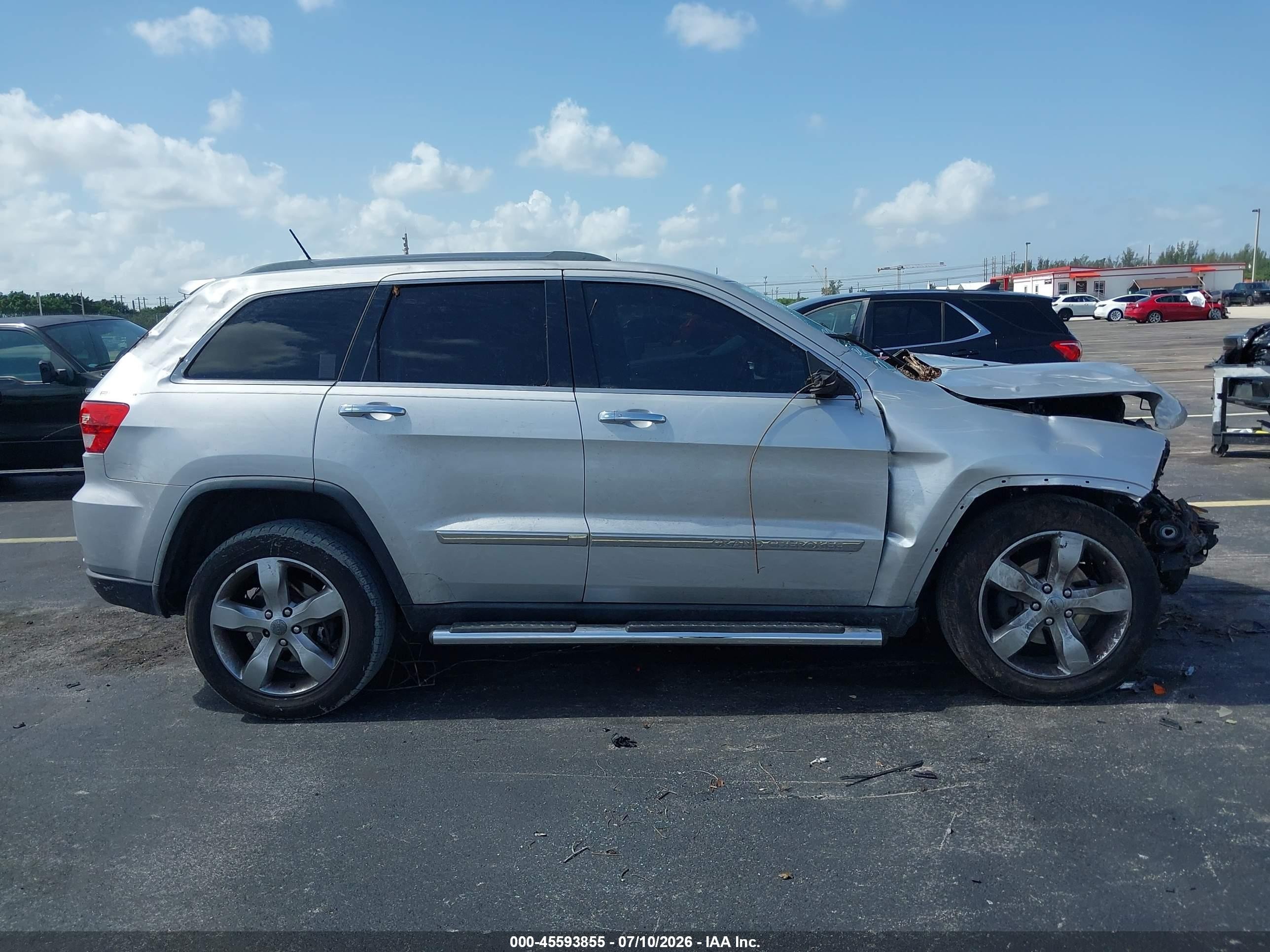 2012 Jeep Grand Cherokee Overland Silver vin: 1C4RJECT2CC281857