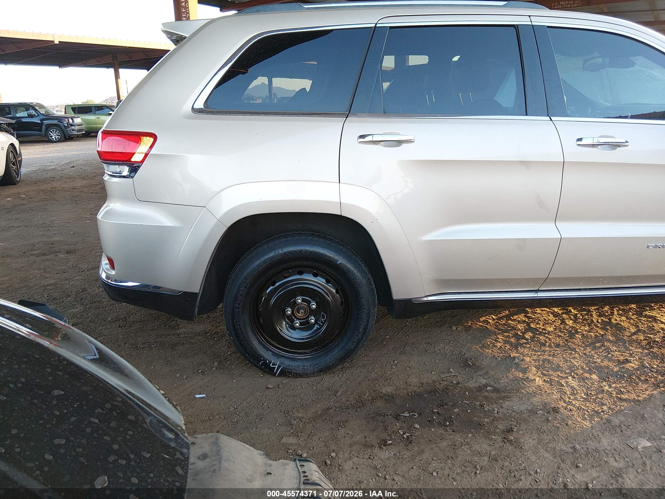 2014 Jeep Grand Cherokee Summit Gold vin: 1C4RJEJG8EC311100
