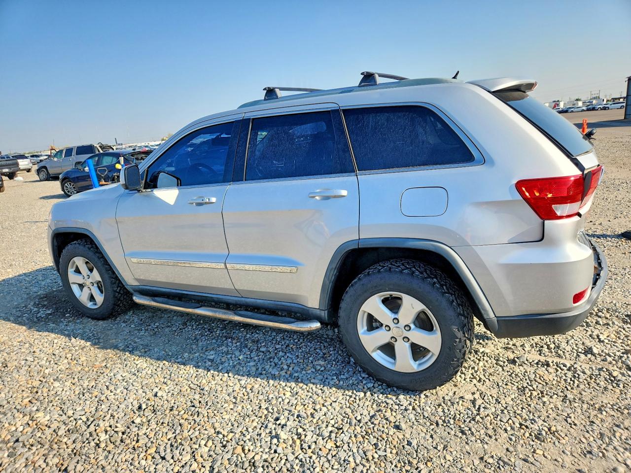 2012 Jeep Grand Cherokee Laredo Silver vin: 1C4RJFAG0CC149823