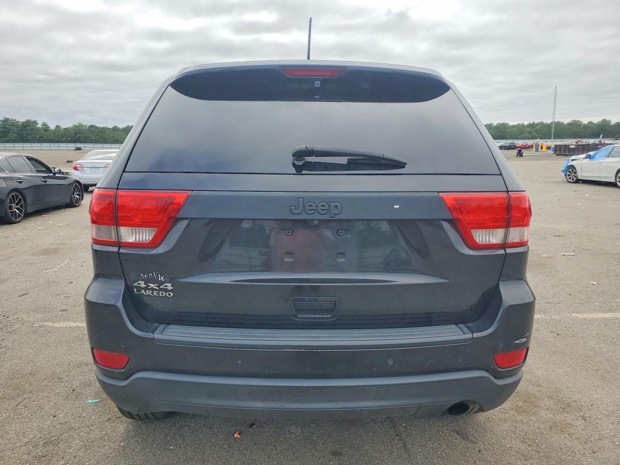 2012 Jeep Grand Cherokee Laredo Черный vin: 1C4RJFAG0CC245354