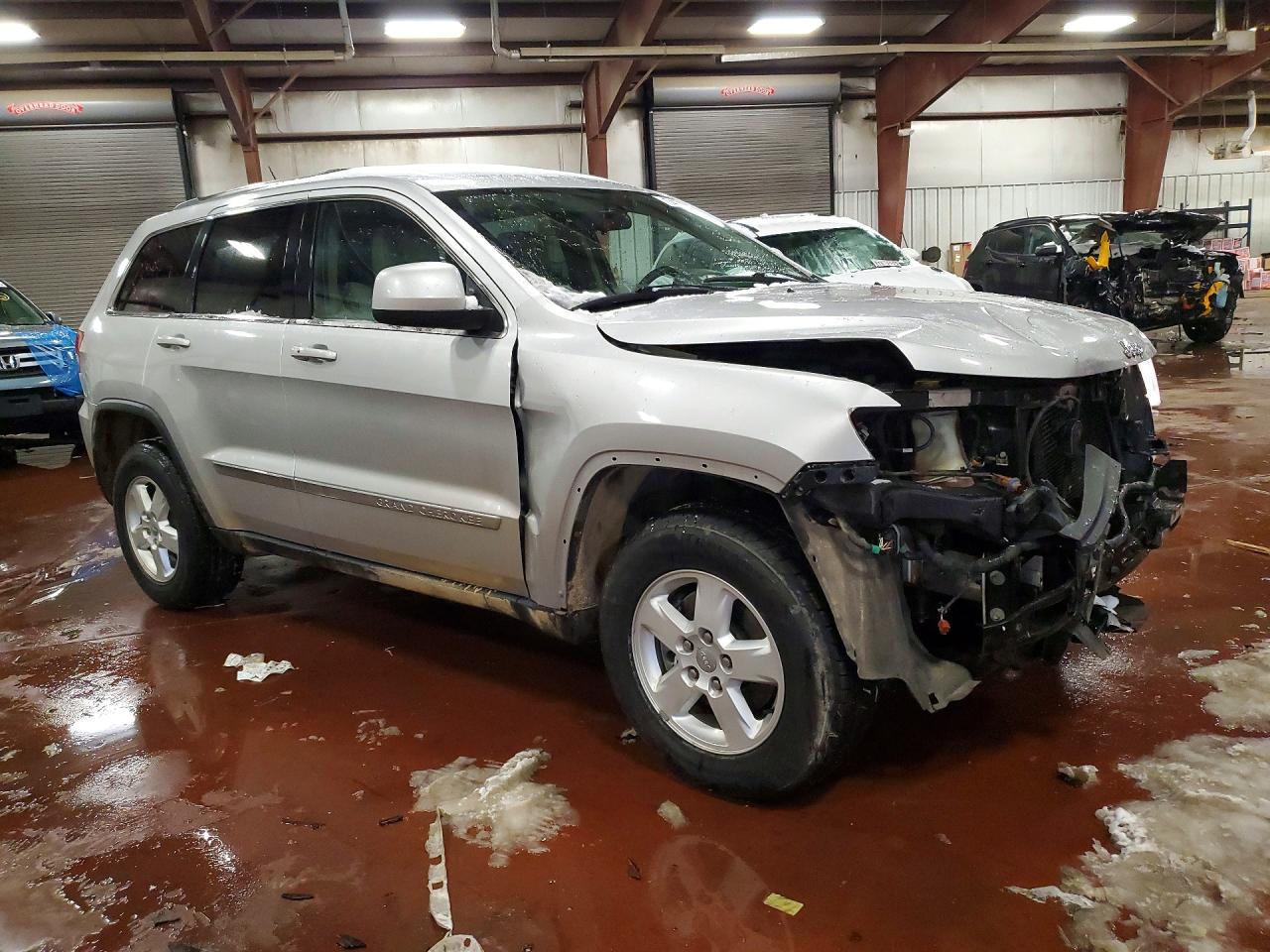 2012 Jeep Grand Cherokee Laredo Серебряный vin: 1C4RJFAG0CC280427