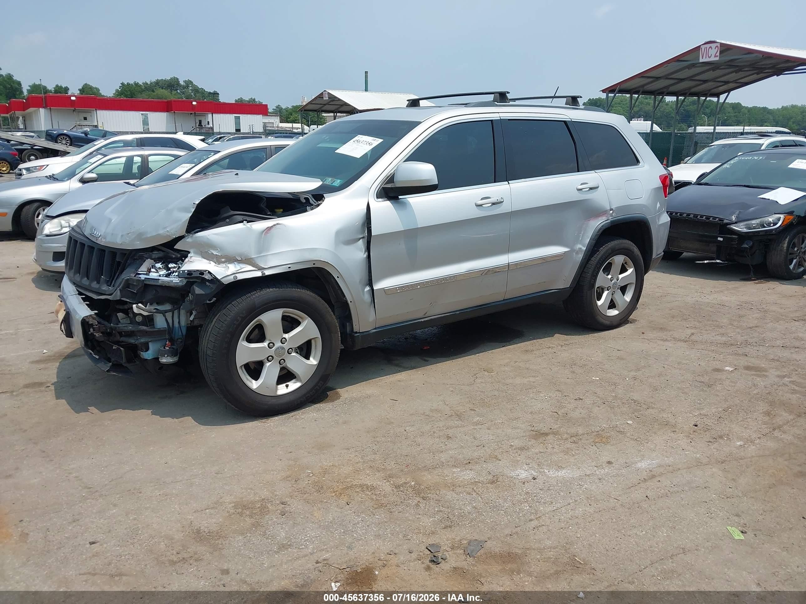 2012 Jeep Grand Cherokee Laredo Silver vin: 1C4RJFAG0CC332929