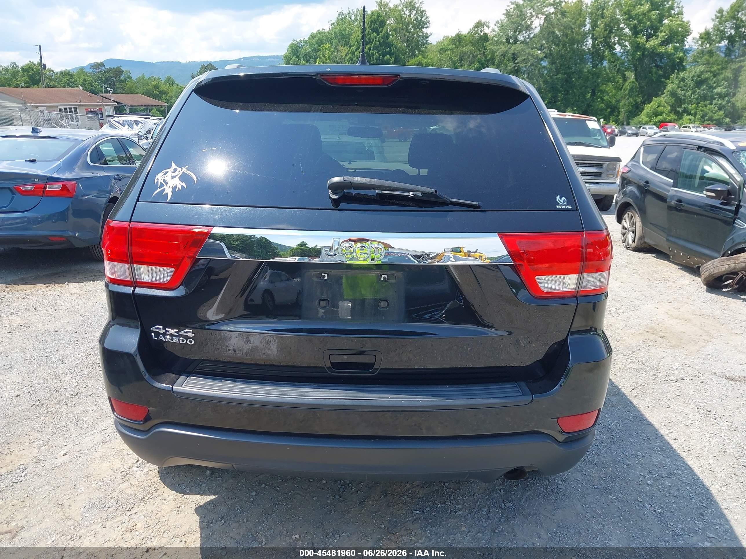 2013 Jeep Grand Cherokee Laredo Черный vin: 1C4RJFAG0DC560947