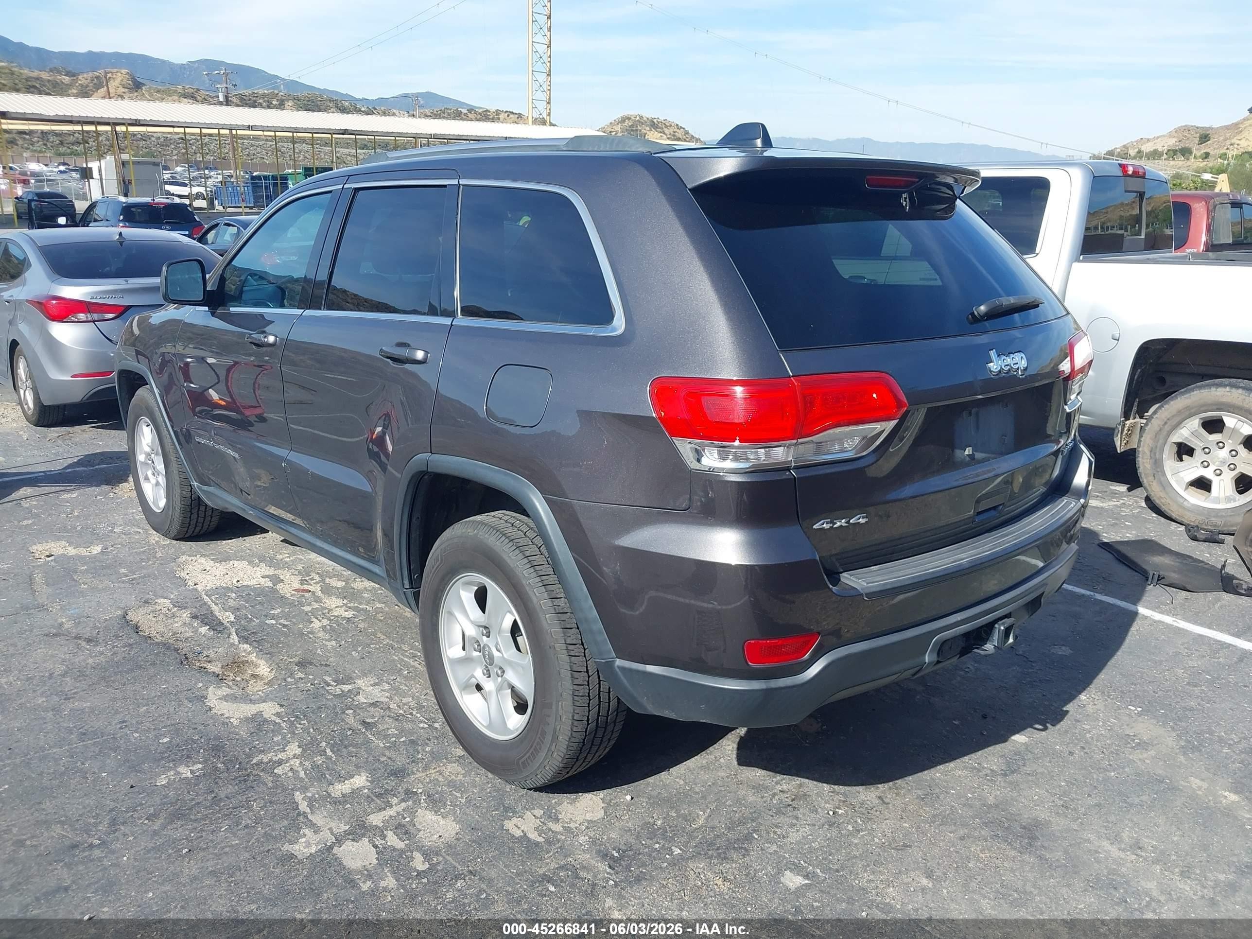 2014 Jeep Grand Cherokee Laredo Серый vin: 1C4RJFAG0EC193887