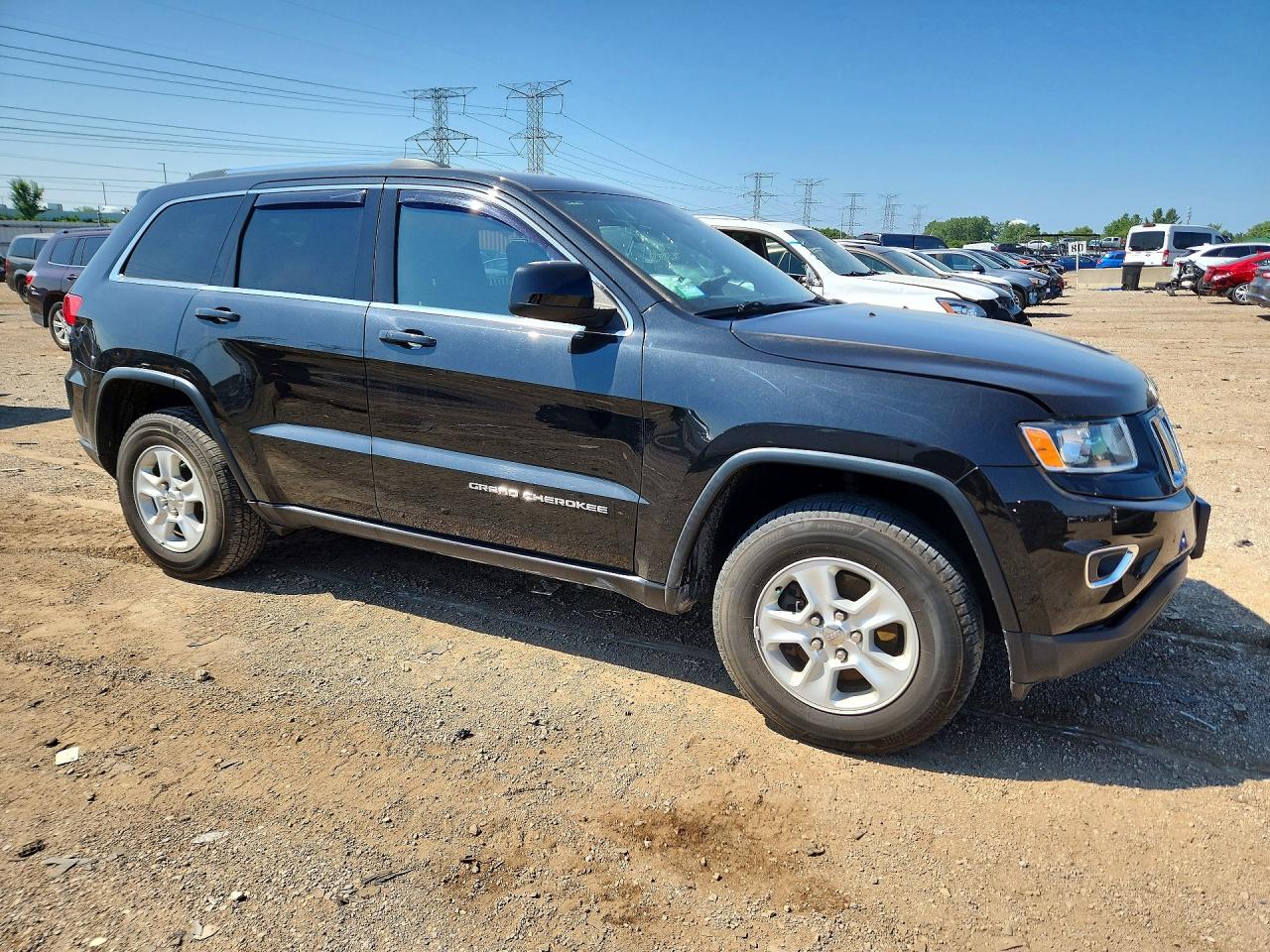 2015 Jeep Grand Cherokee Laredo Черный vin: 1C4RJFAG0FC140592