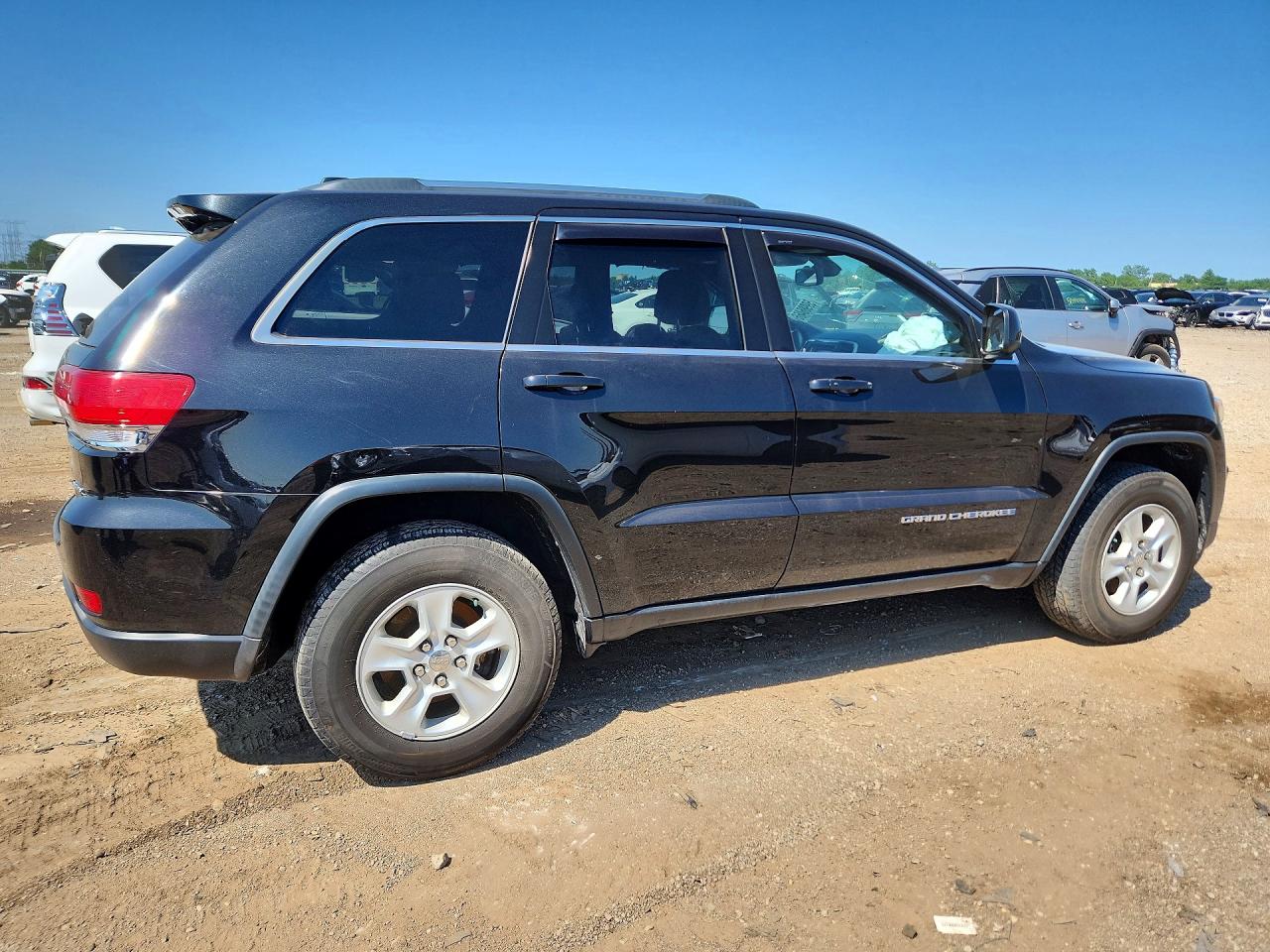 2015 Jeep Grand Cherokee Laredo Черный vin: 1C4RJFAG0FC140592