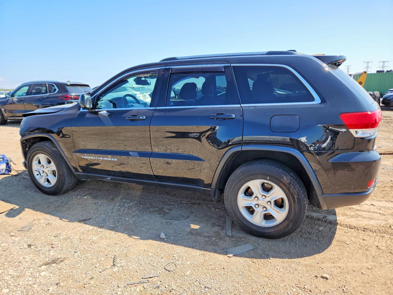 2015 Jeep Grand Cherokee Laredo Черный vin: 1C4RJFAG0FC140592
