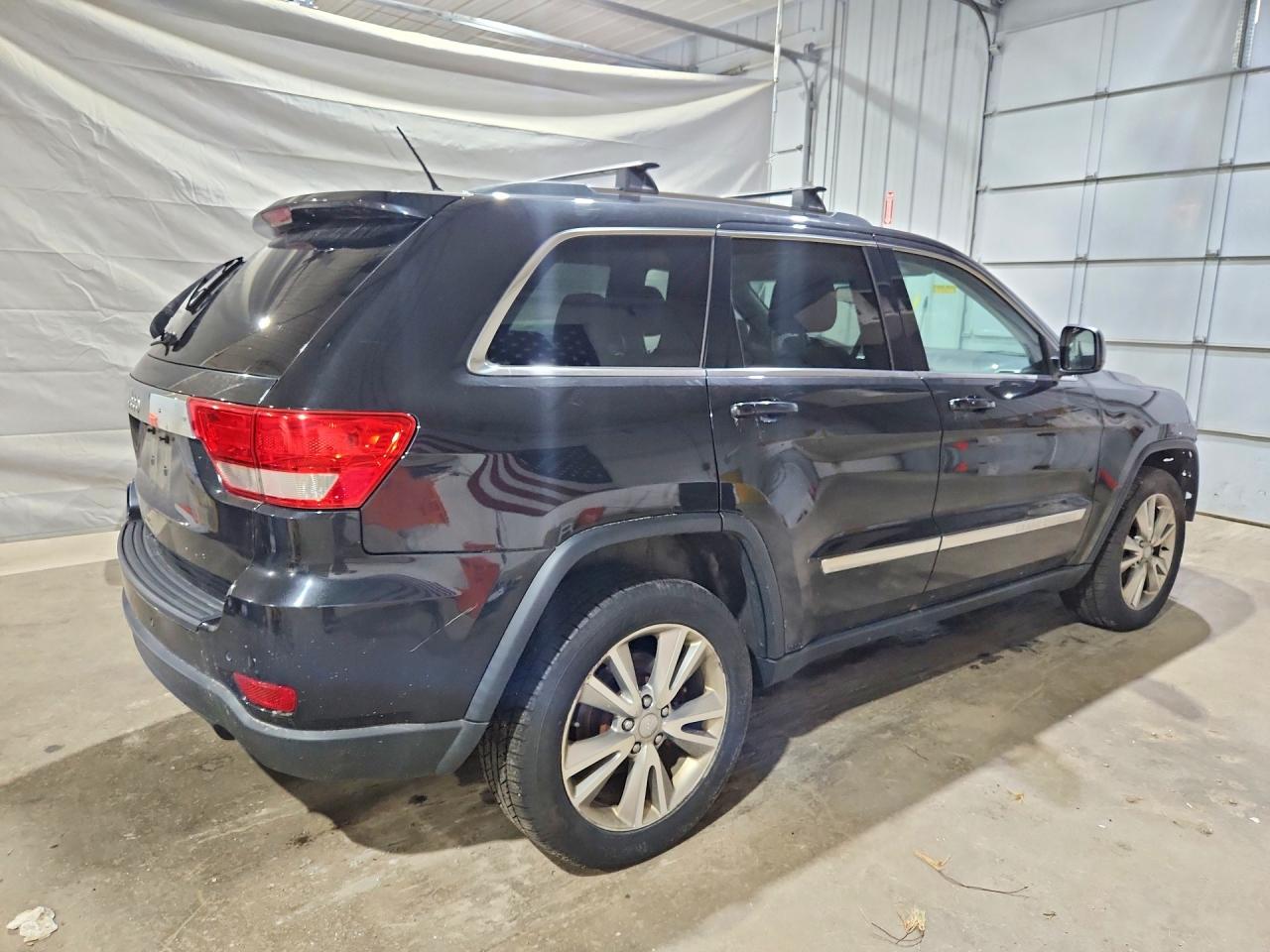 2013 Jeep Grand Cherokee Laredo Черный vin: 1C4RJFAG1DC649975