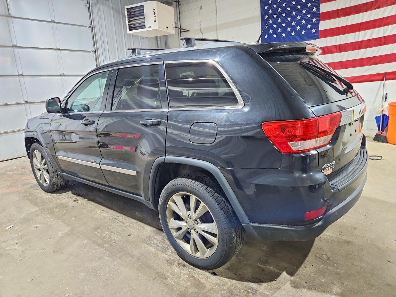 2013 Jeep Grand Cherokee Laredo Черный vin: 1C4RJFAG1DC649975