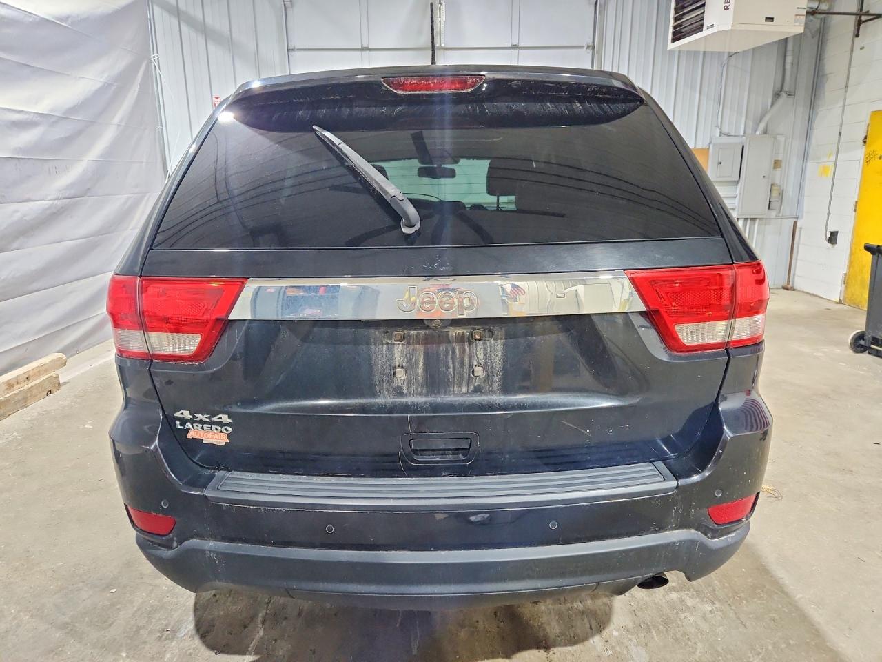 2013 Jeep Grand Cherokee Laredo Черный vin: 1C4RJFAG1DC649975