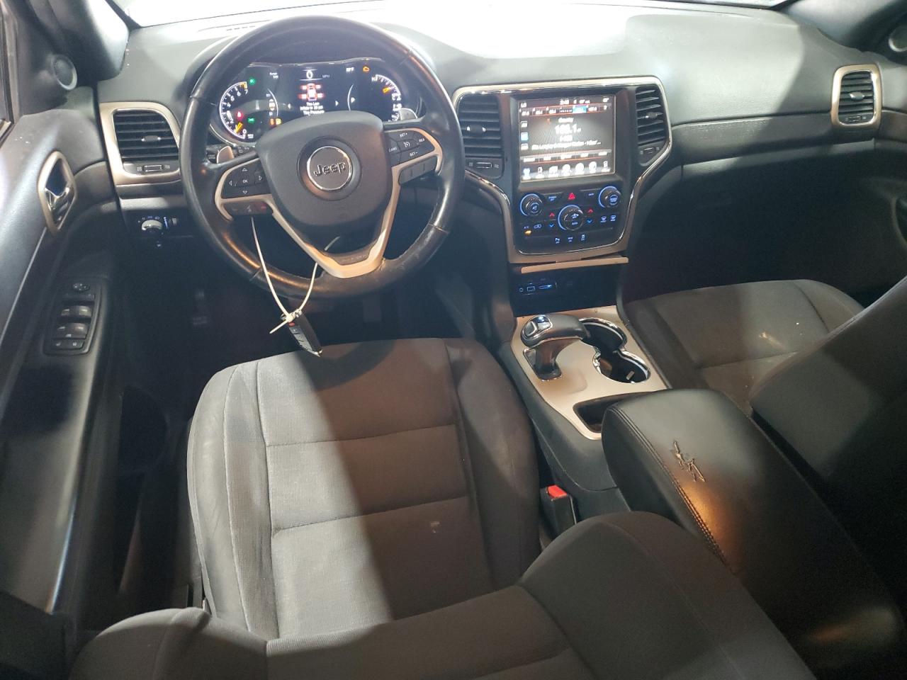 2015 Jeep Grand Cherokee Laredo Gray vin: 1C4RJFAG1FC212433 Damage: Front Center Armrest, Cut, 4 To 5 Inches