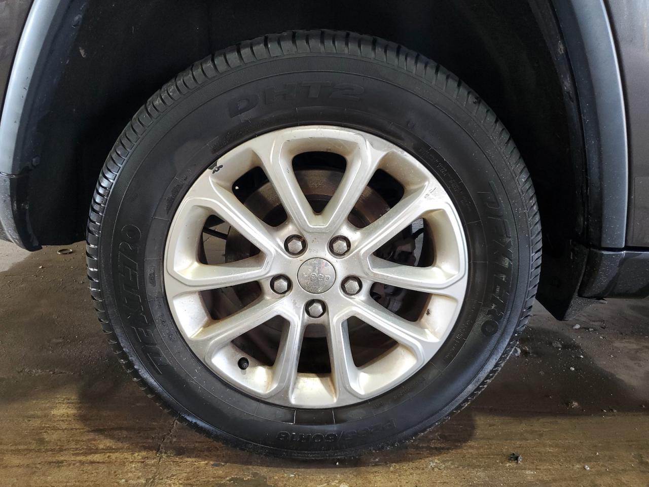 2015 Jeep Grand Cherokee Laredo Gray vin: 1C4RJFAG1FC212433 Damage: Right Rear Wheel, Curb Rash, 7 To 8 Inches