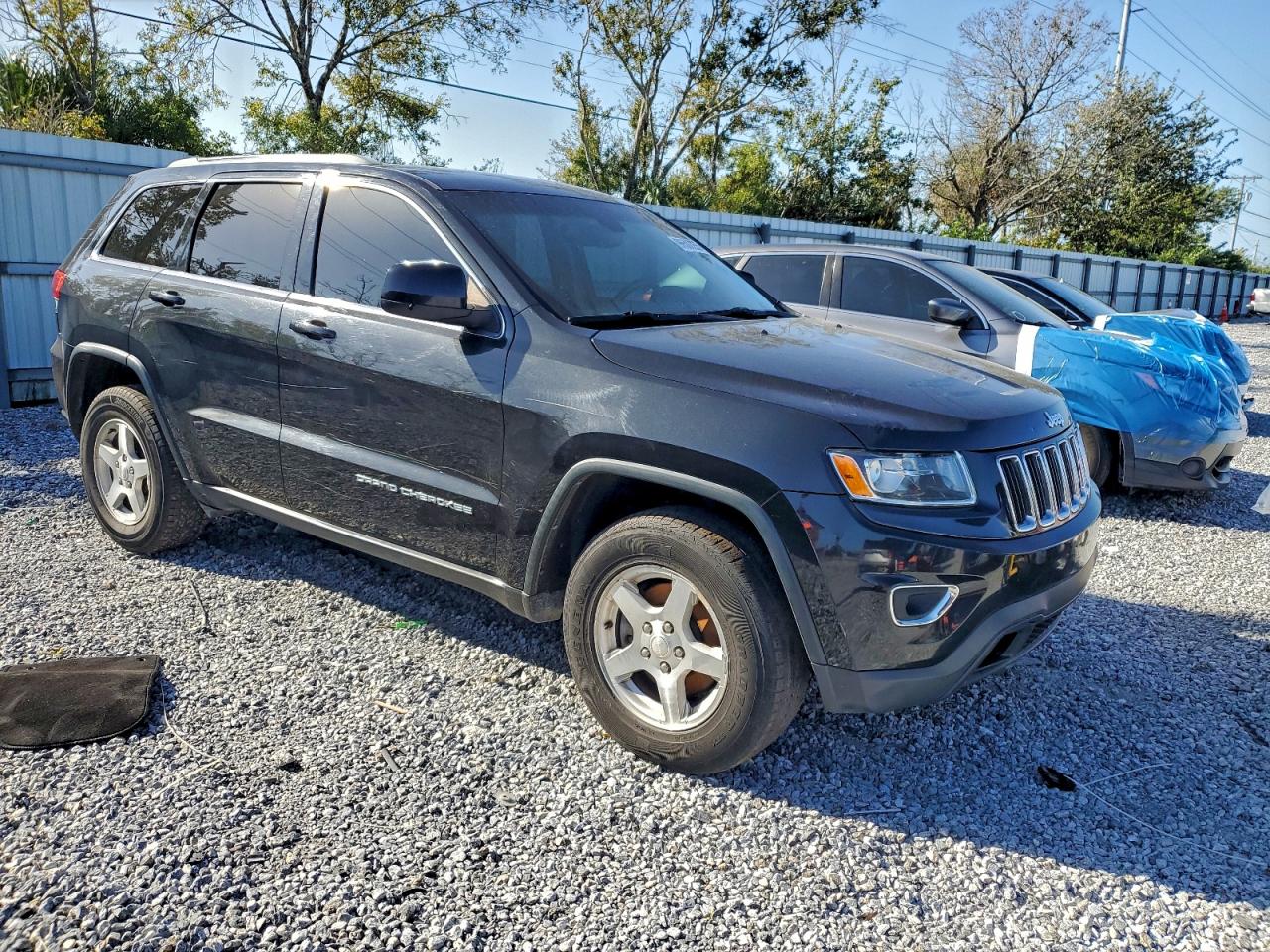 2015 Jeep Grand Cherokee Laredo Черный vin: 1C4RJFAG1FC871175