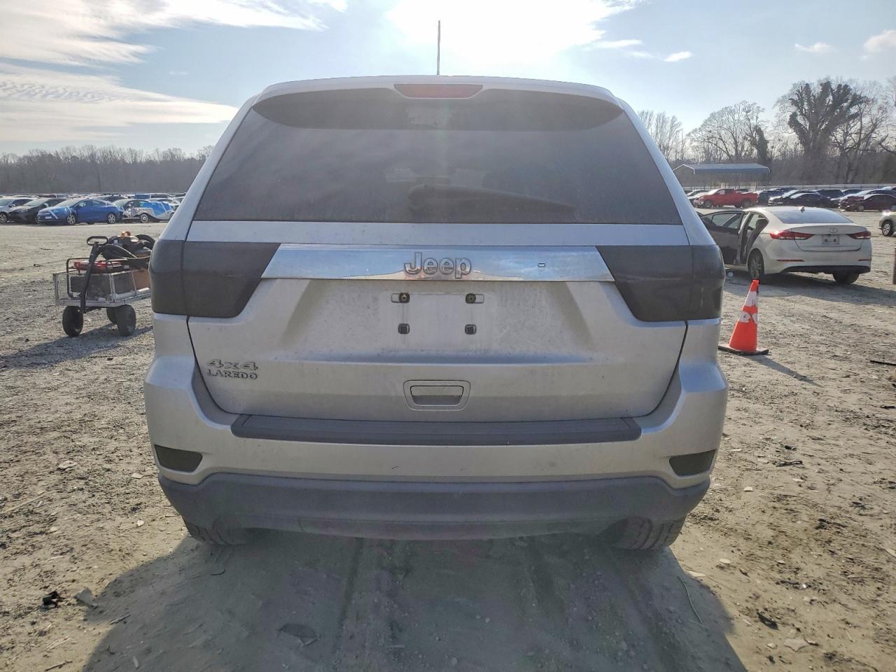 2012 Jeep Grand Cherokee Laredo Серебряный vin: 1C4RJFAG2CC148740