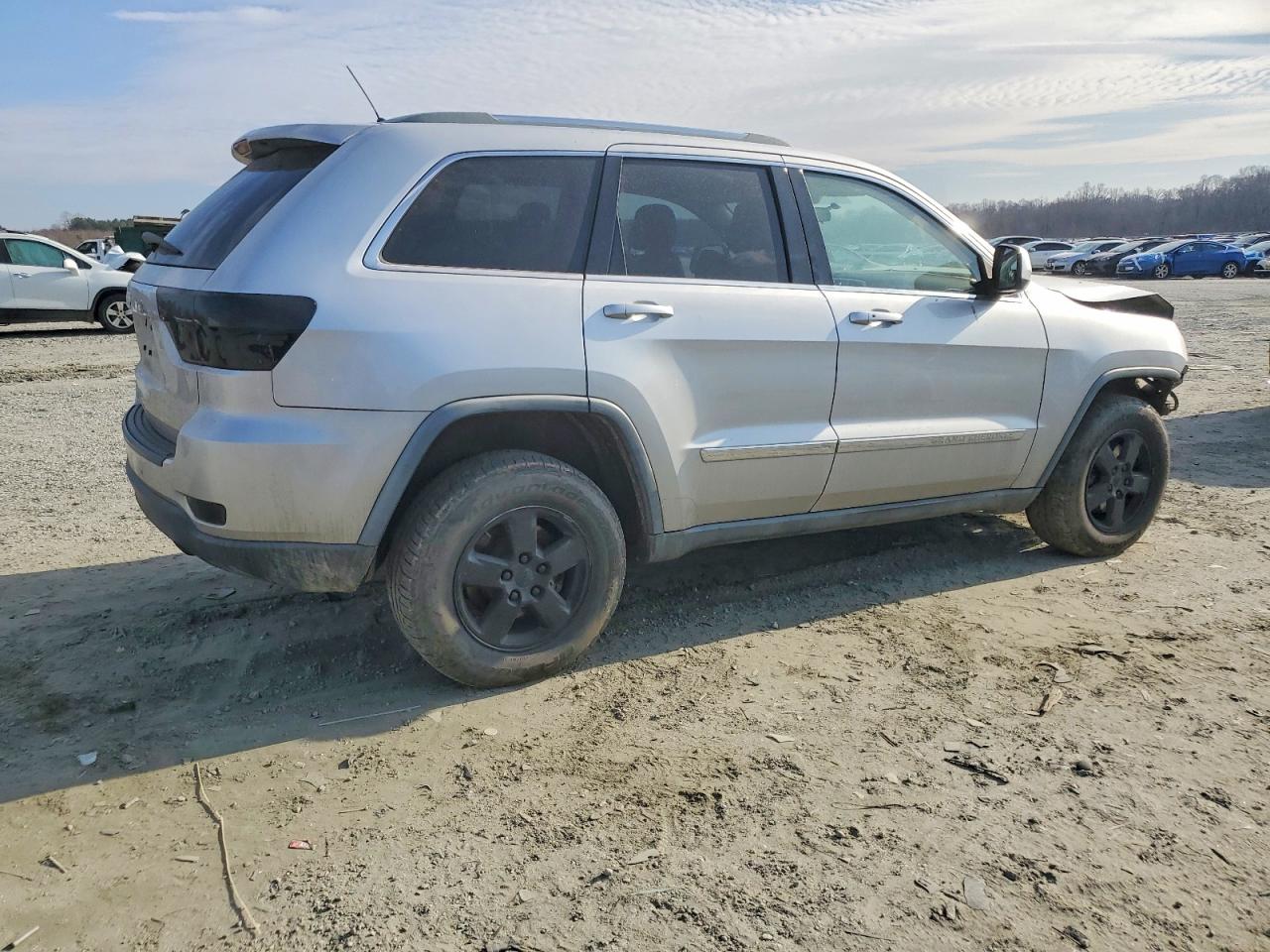 2012 Jeep Grand Cherokee Laredo Серебряный vin: 1C4RJFAG2CC148740
