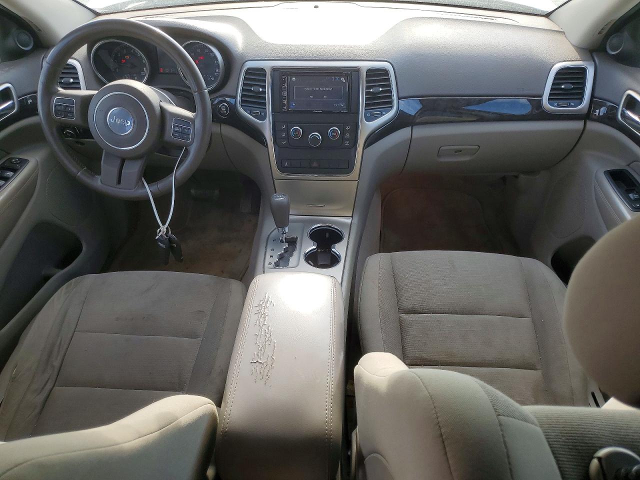2012 Jeep Grand Cherokee Laredo Серебряный vin: 1C4RJFAG2CC148740