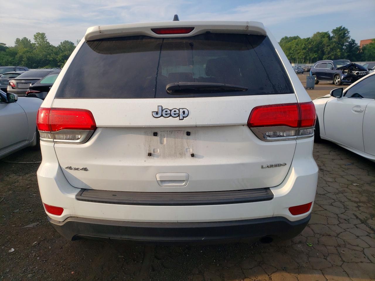 2014 Jeep Grand Cherokee Laredo Белый vin: 1C4RJFAG2EC577864
