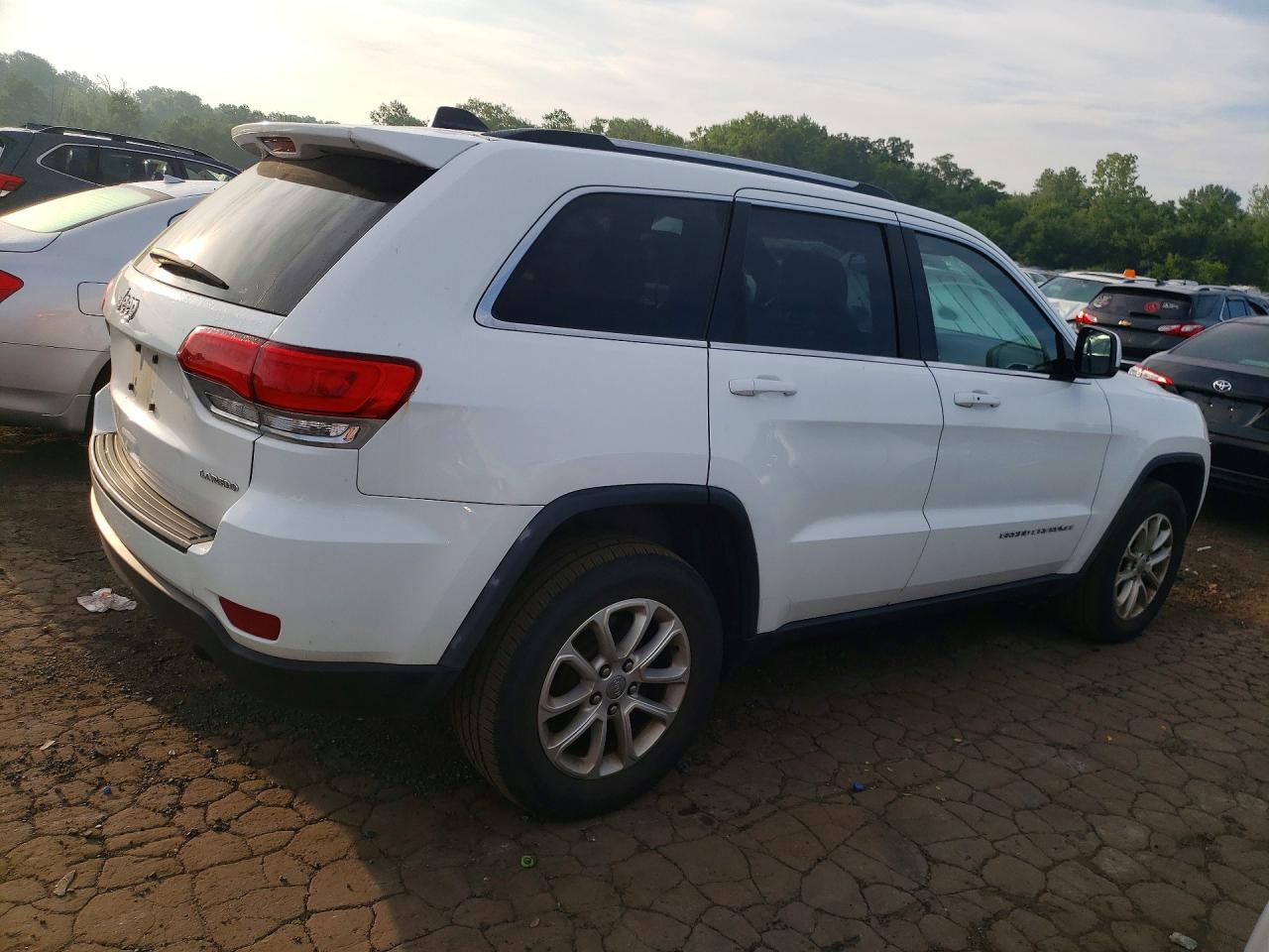 2014 Jeep Grand Cherokee Laredo Белый vin: 1C4RJFAG2EC577864