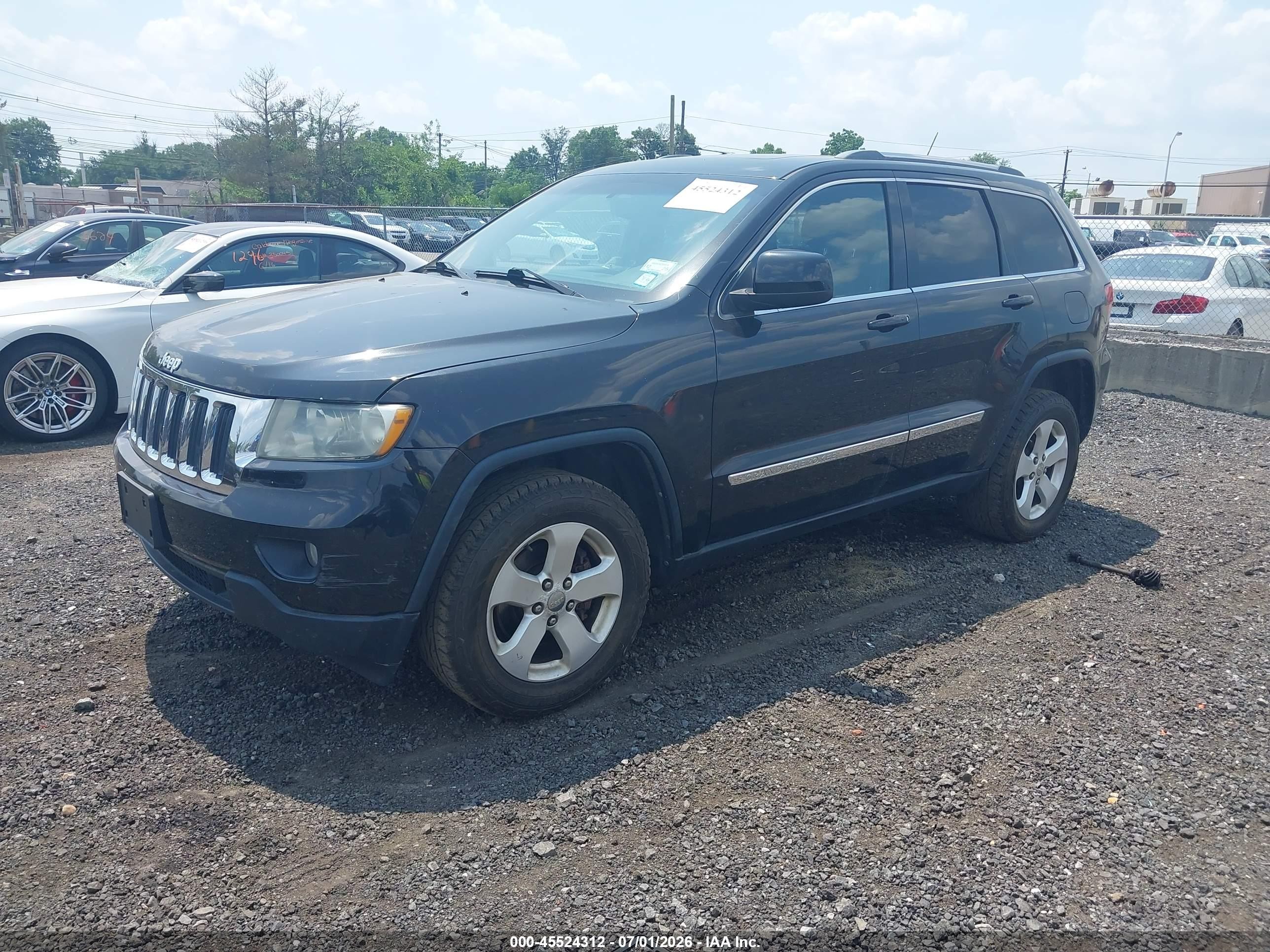 2012 Jeep Grand Cherokee Laredo Черный vin: 1C4RJFAG3CC268921