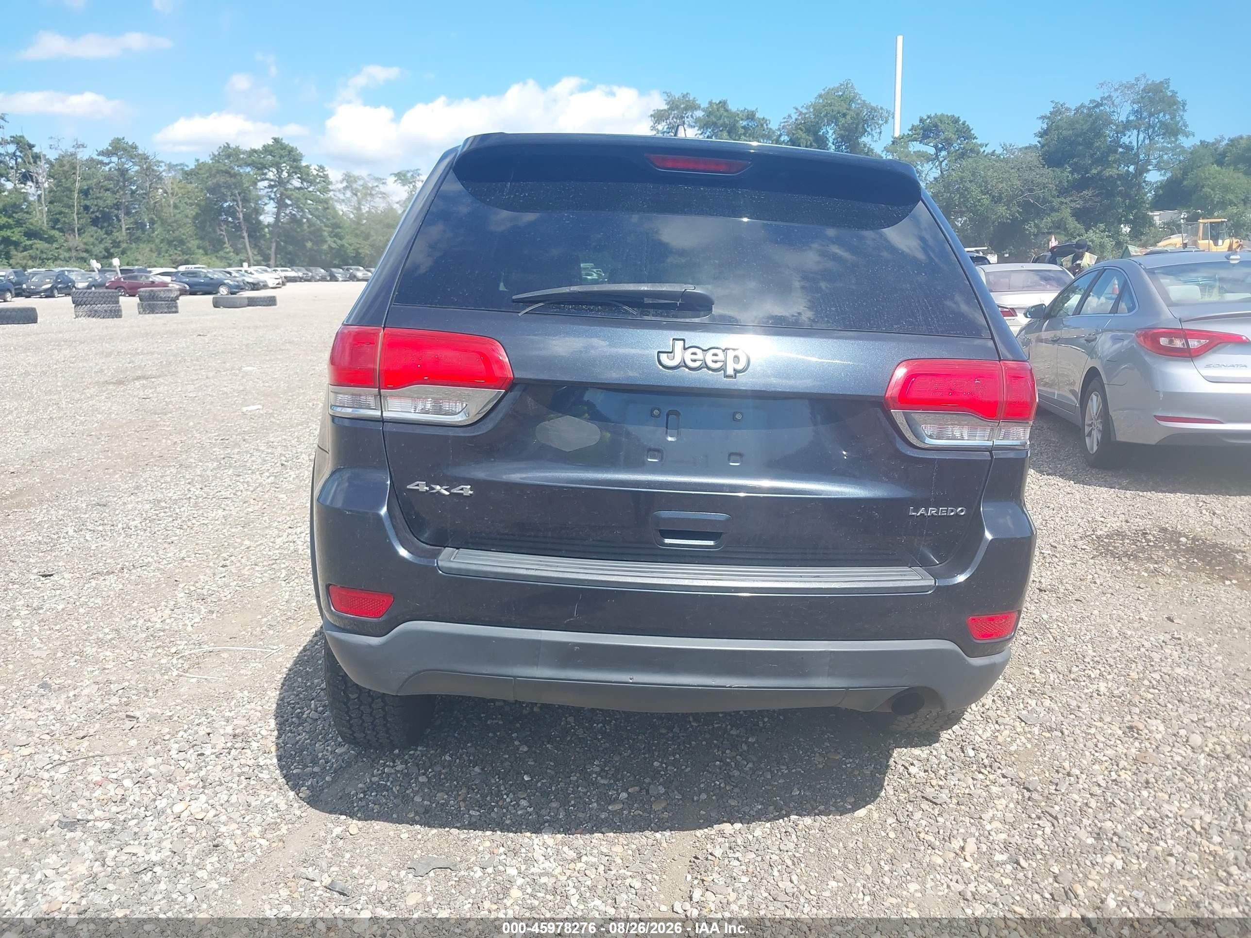 2014 Jeep Grand Cherokee Laredo Черный vin: 1C4RJFAG3EC568476