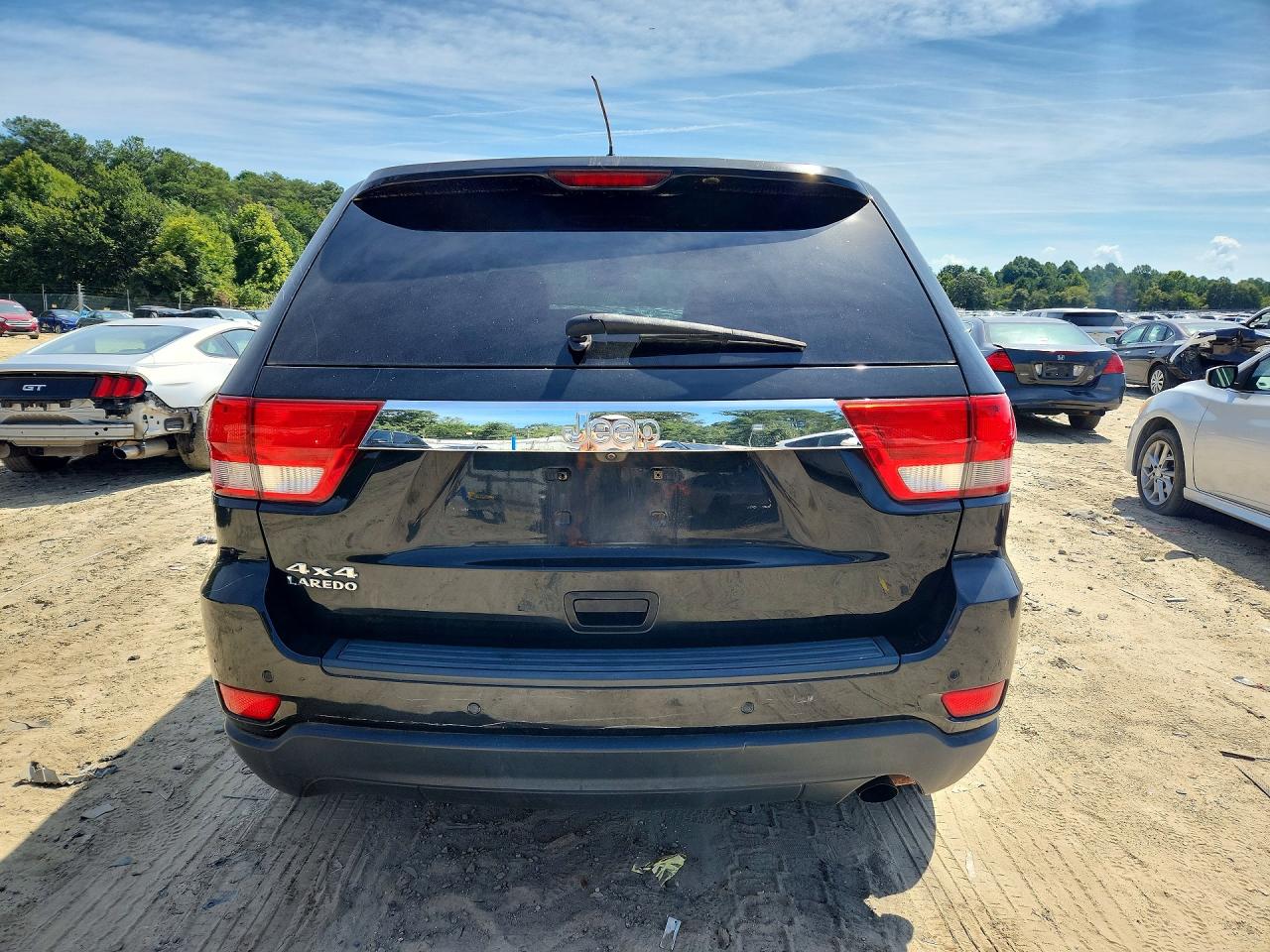 2012 Jeep Grand Cherokee Laredo Черный vin: 1C4RJFAG4CC145144